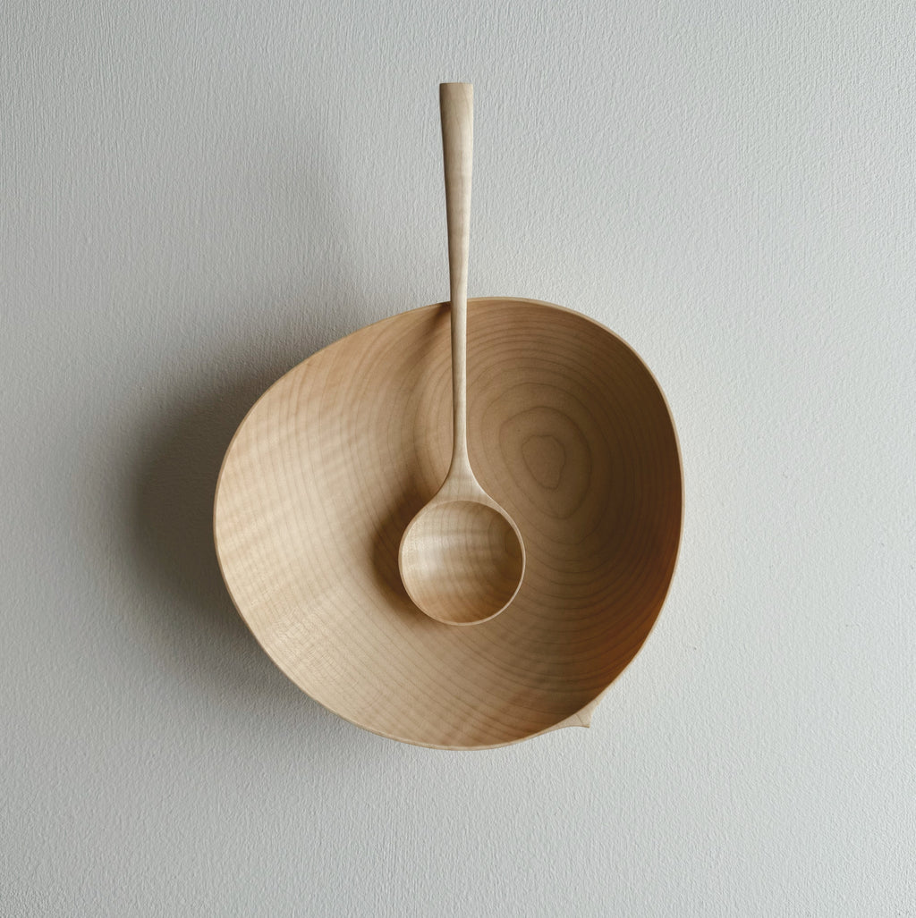 Sycamore bowl and spoon on a white background