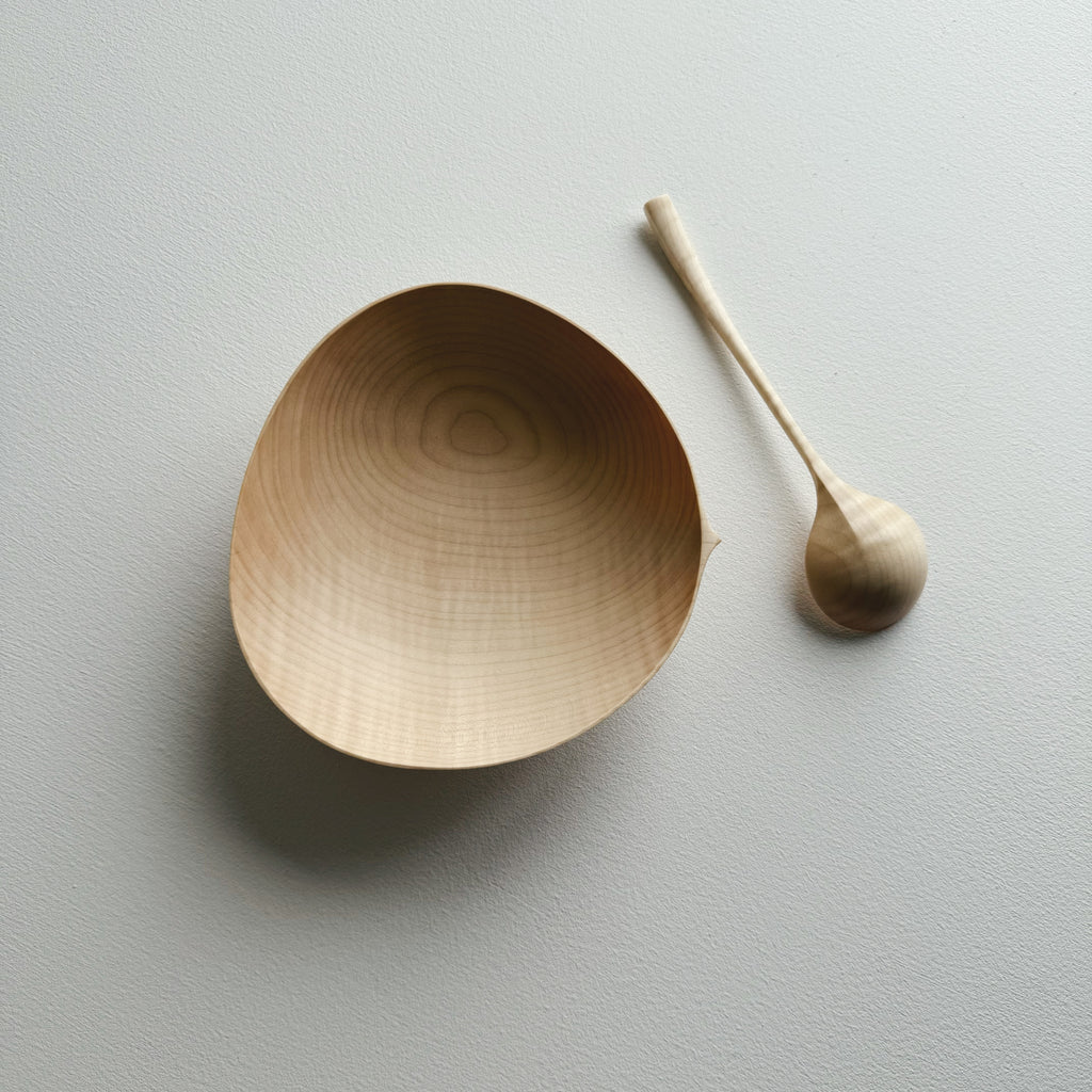 Sycamore bowl and spoon on a white background