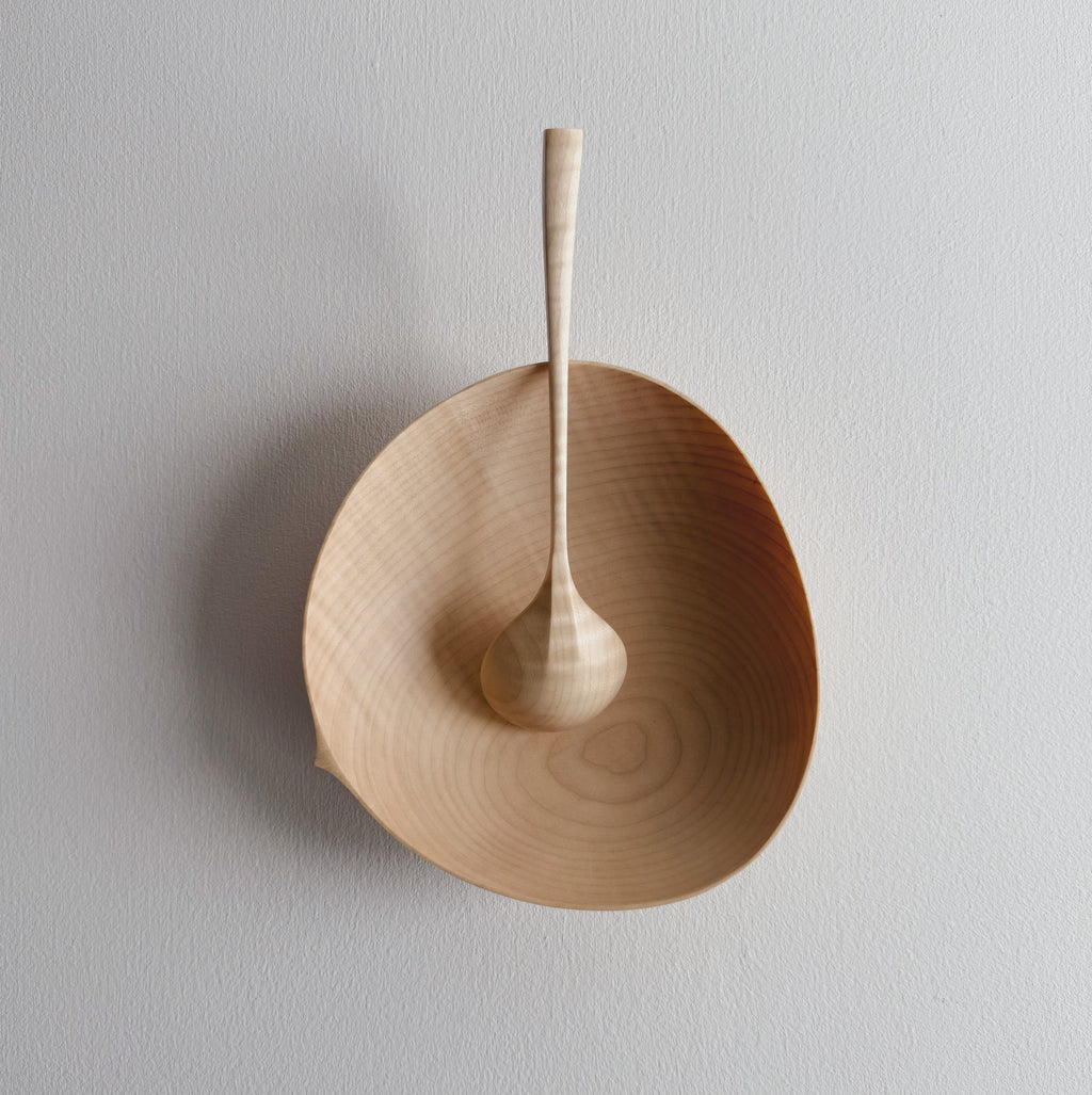 Sycamore bowl and spoon on a white background