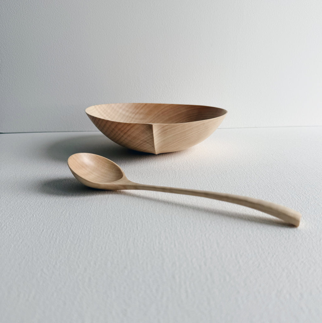 Sycamore bowl and spoon on a white background