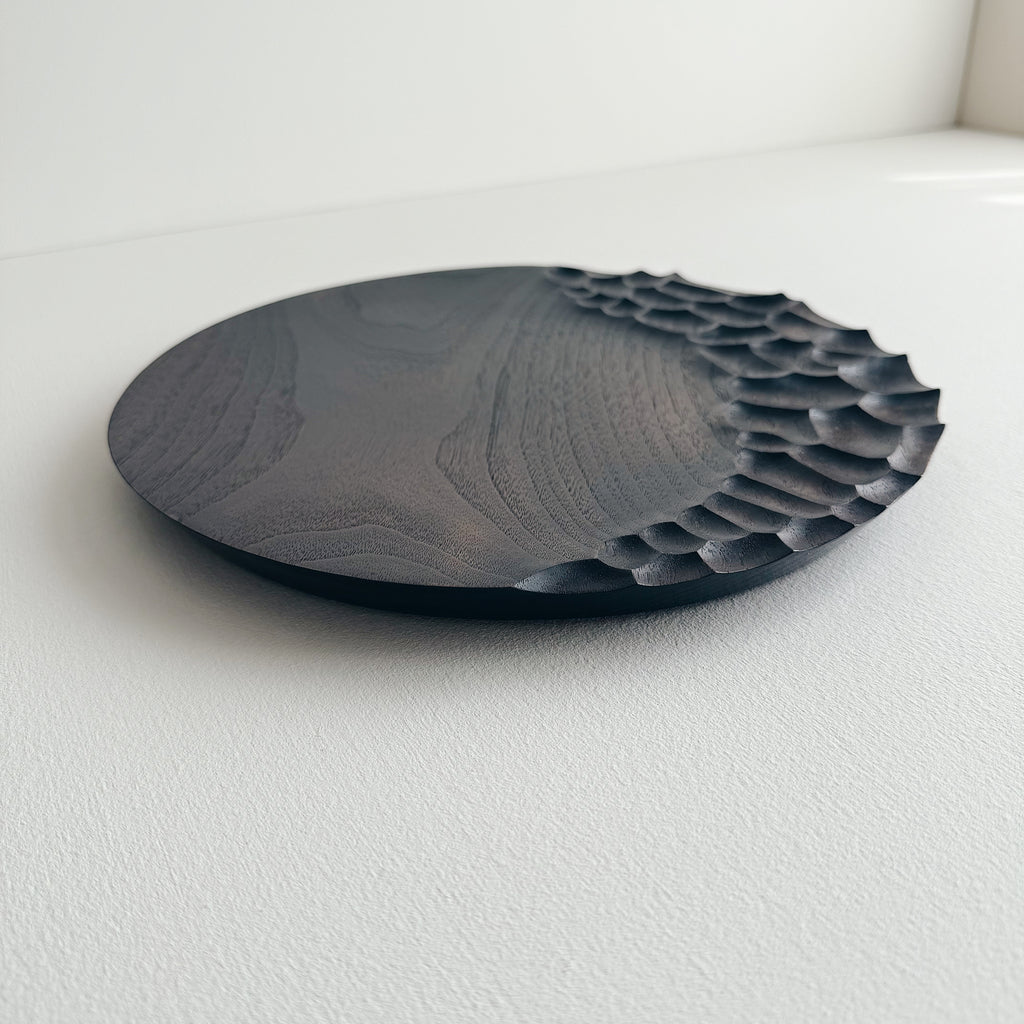 Black walnut presentation plate on a white background 