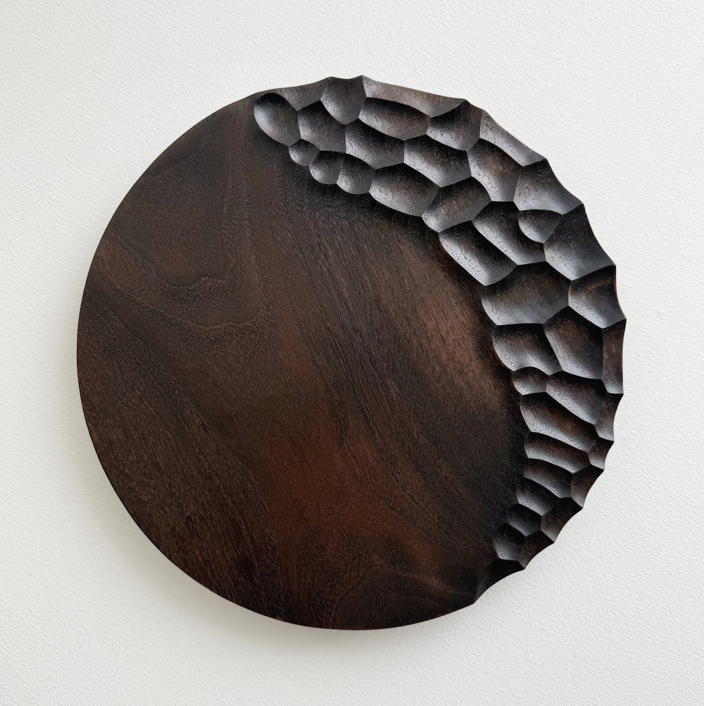 Black walnut presentation plate on a white background 
