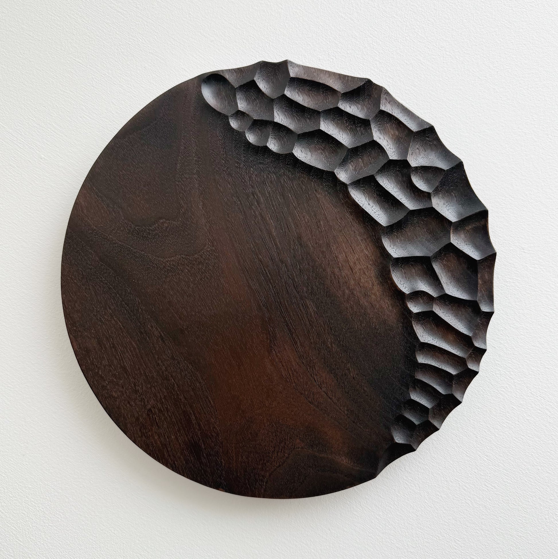 Black walnut presentation plate on a white background 