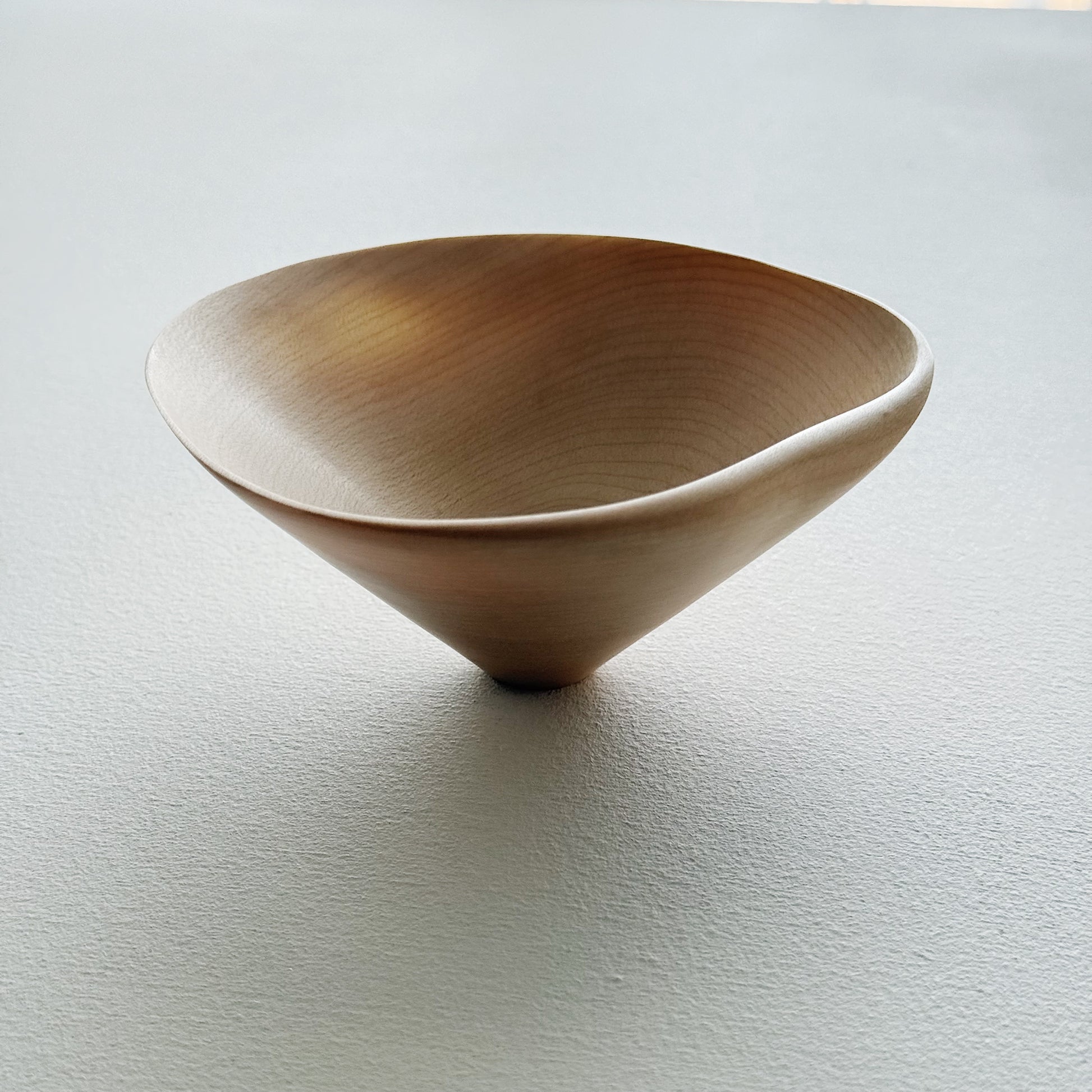 Conical sculptural bowl
