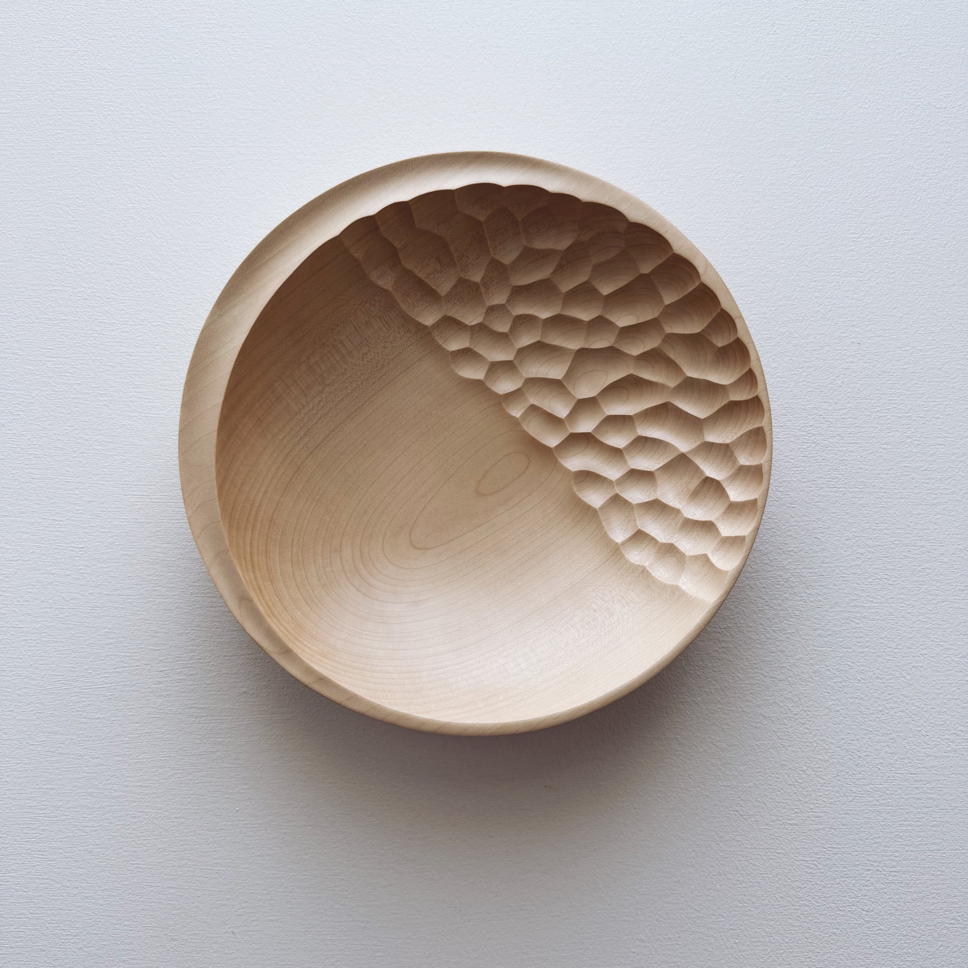 Cratered presentation bowl in sycamore
