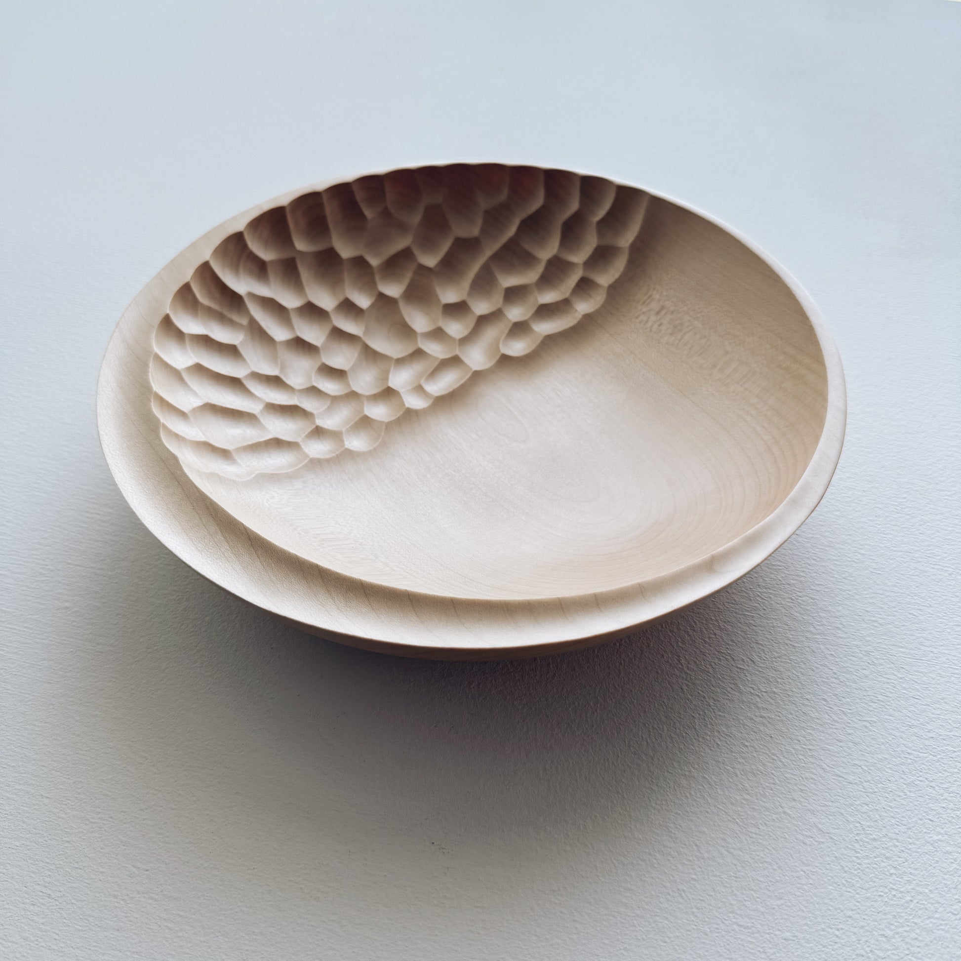 Cratered presentation bowl in sycamore