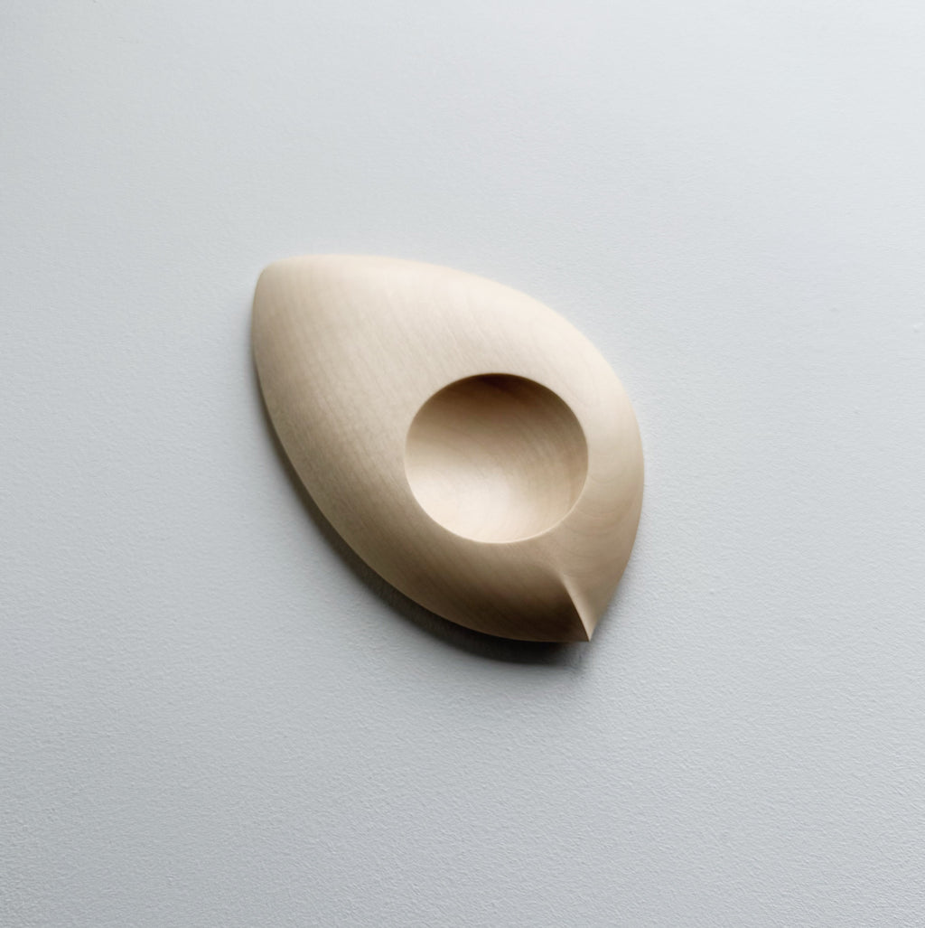 Droplet dish in sycamore on a light background