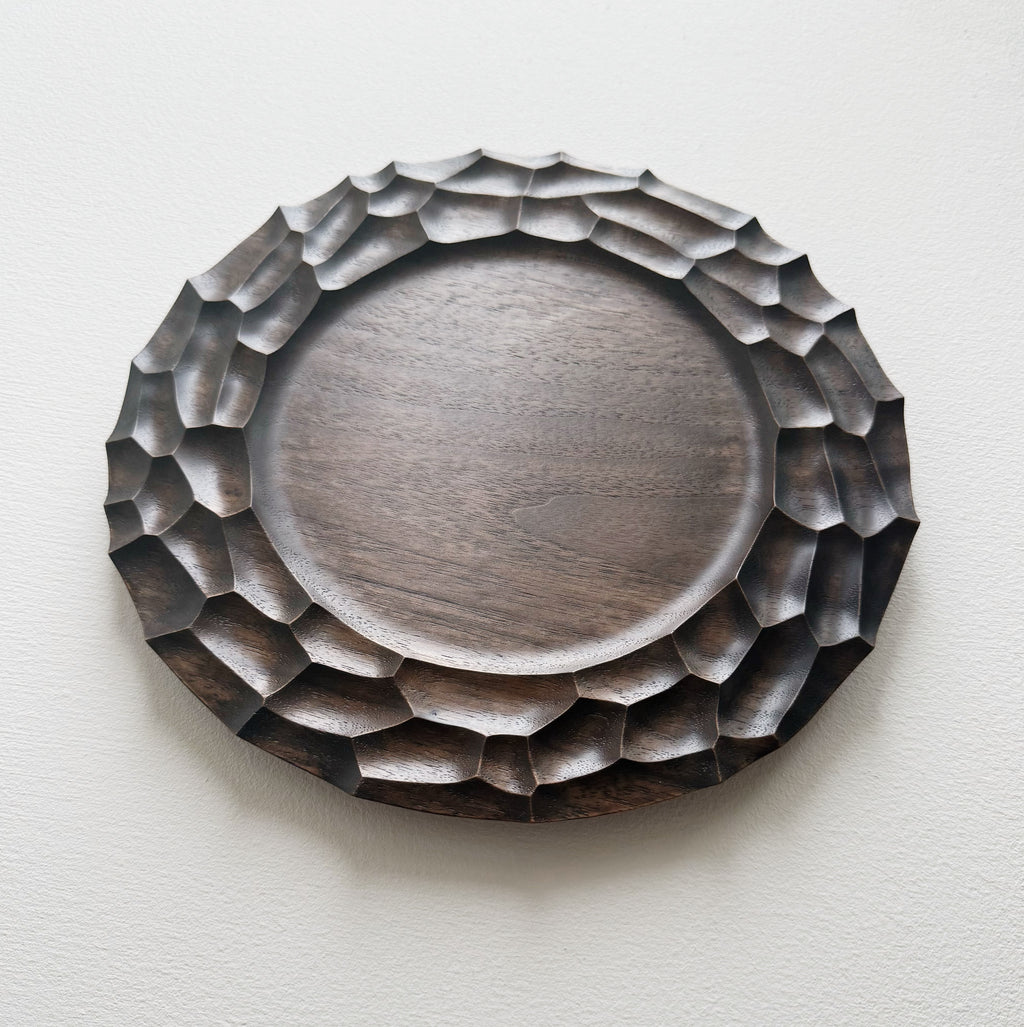 Walnut plate on a white background