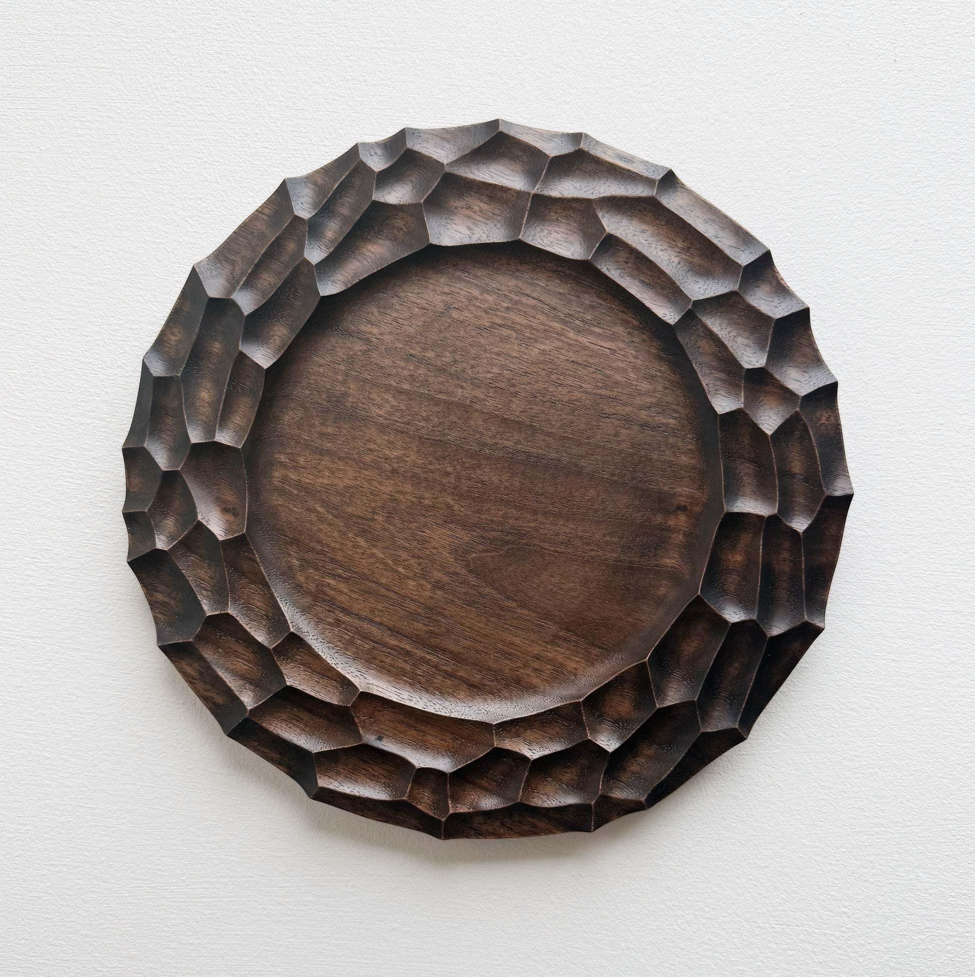 Walnut plate on a white background