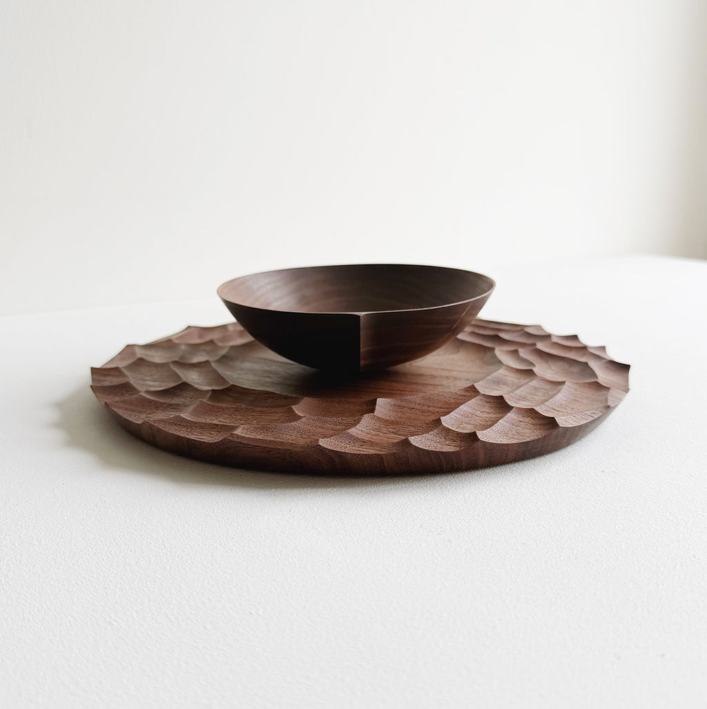 Dunes plate and bowl in walnut on a light background