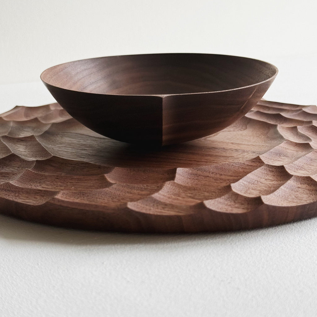 Dunes plate and bowl in walnut on a light background