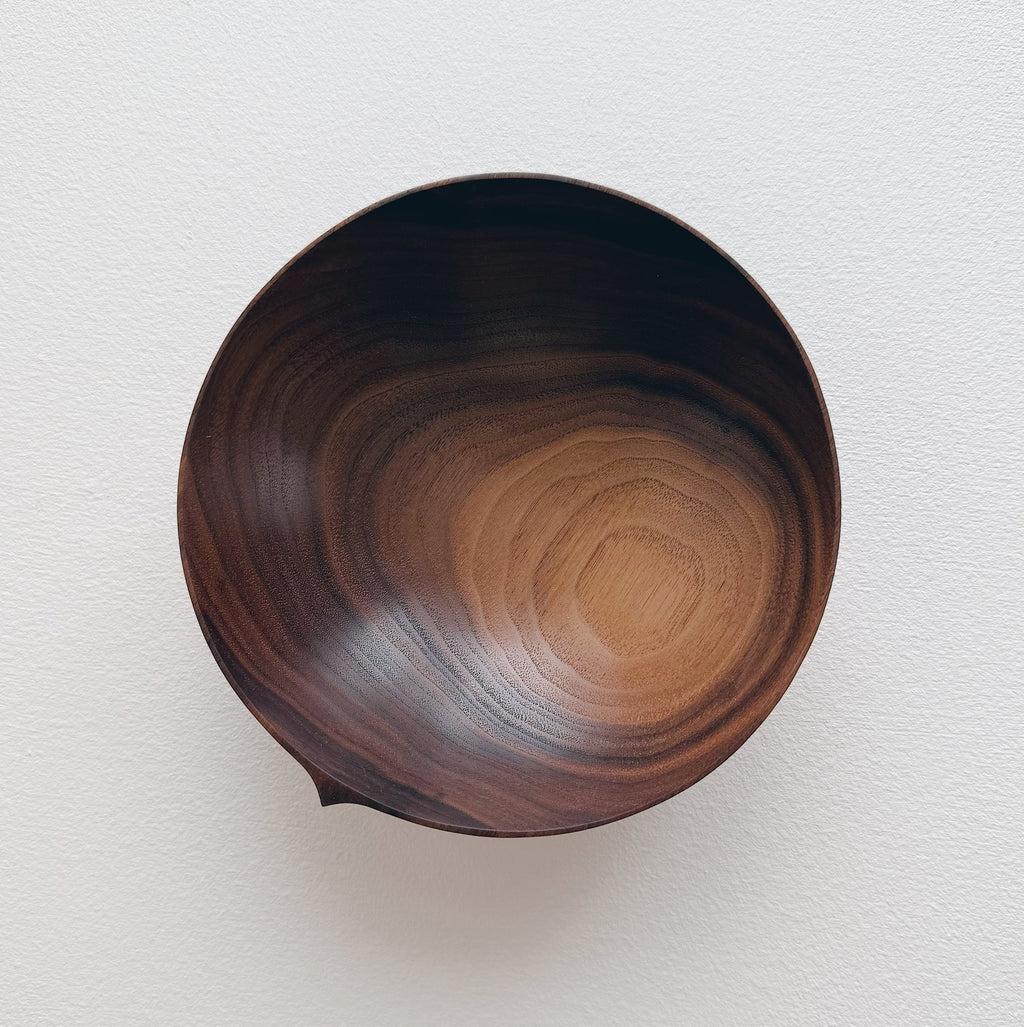 Walnut eating set with bowl on a white background 