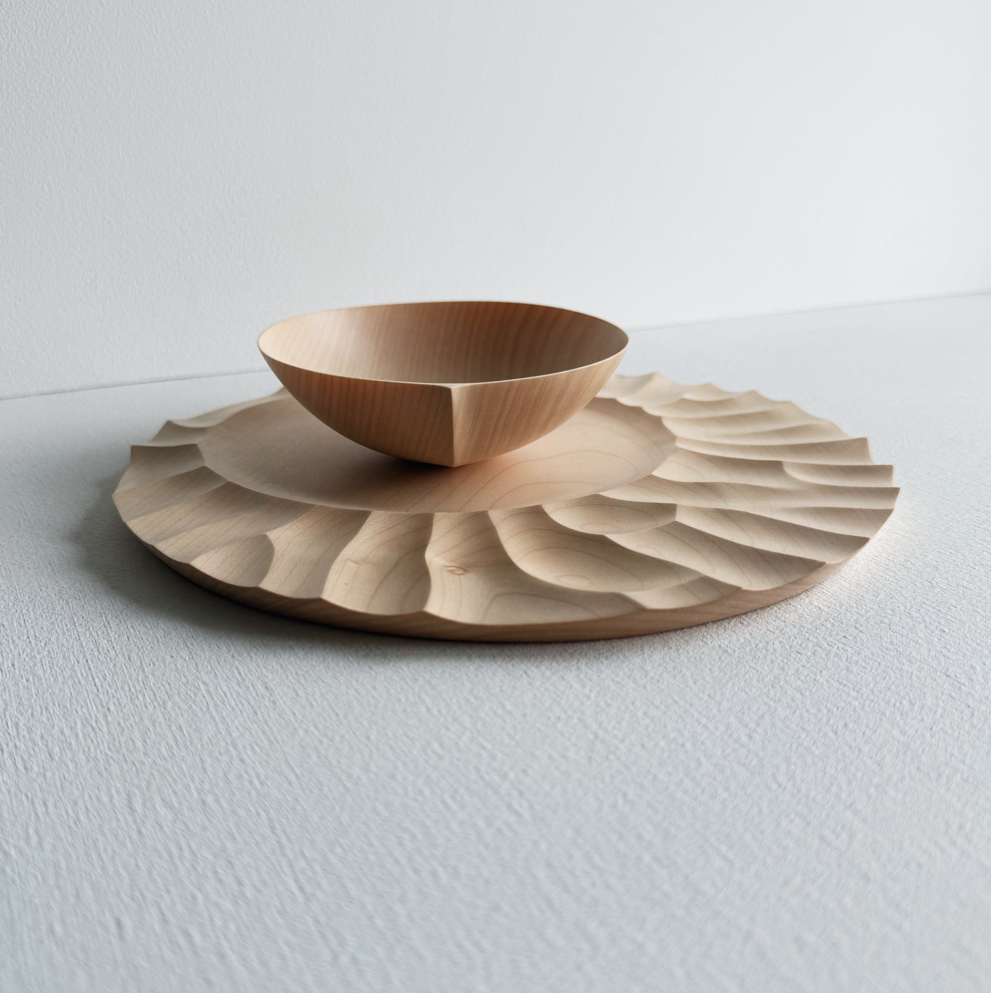 Sycamore wooden bowl with sycamore plate on a white background