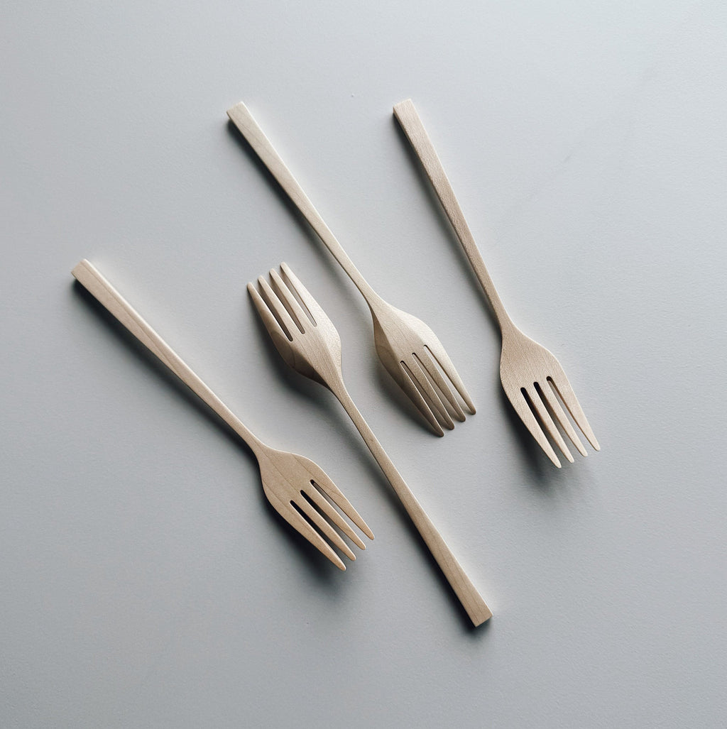 Set of four sycamore forks on light background