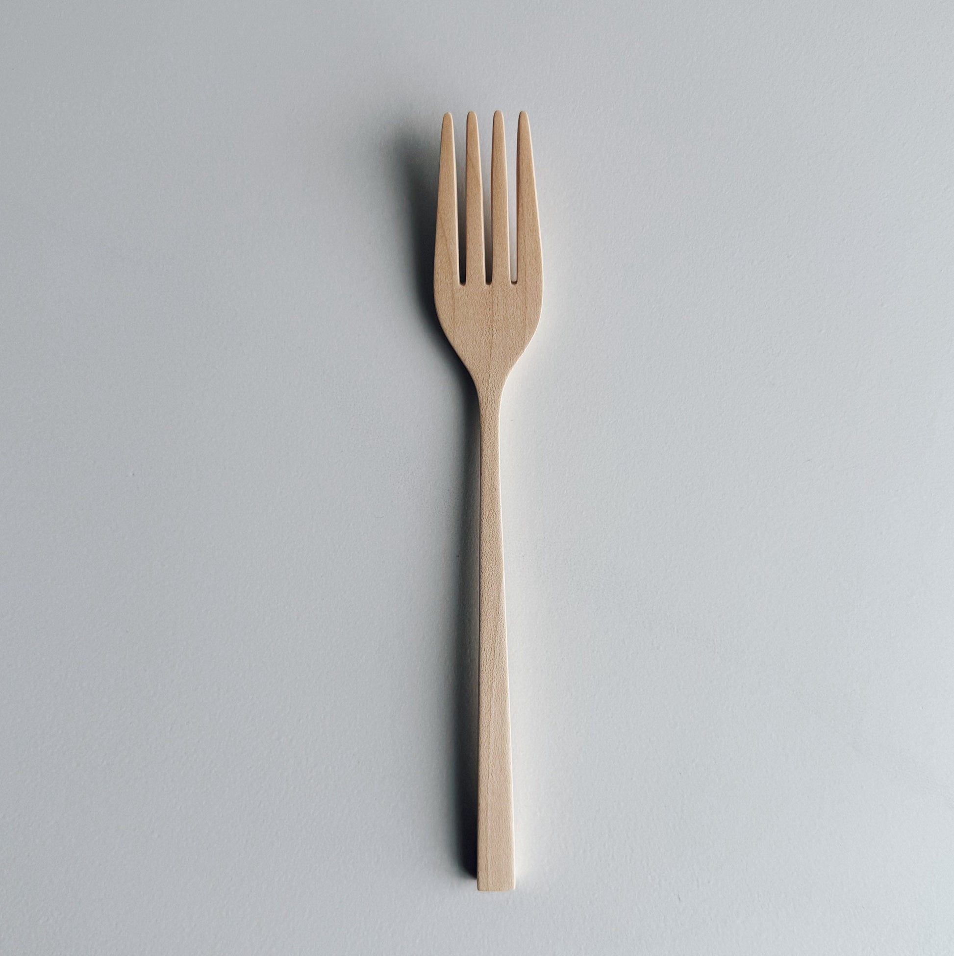 Sycamore fork on light background