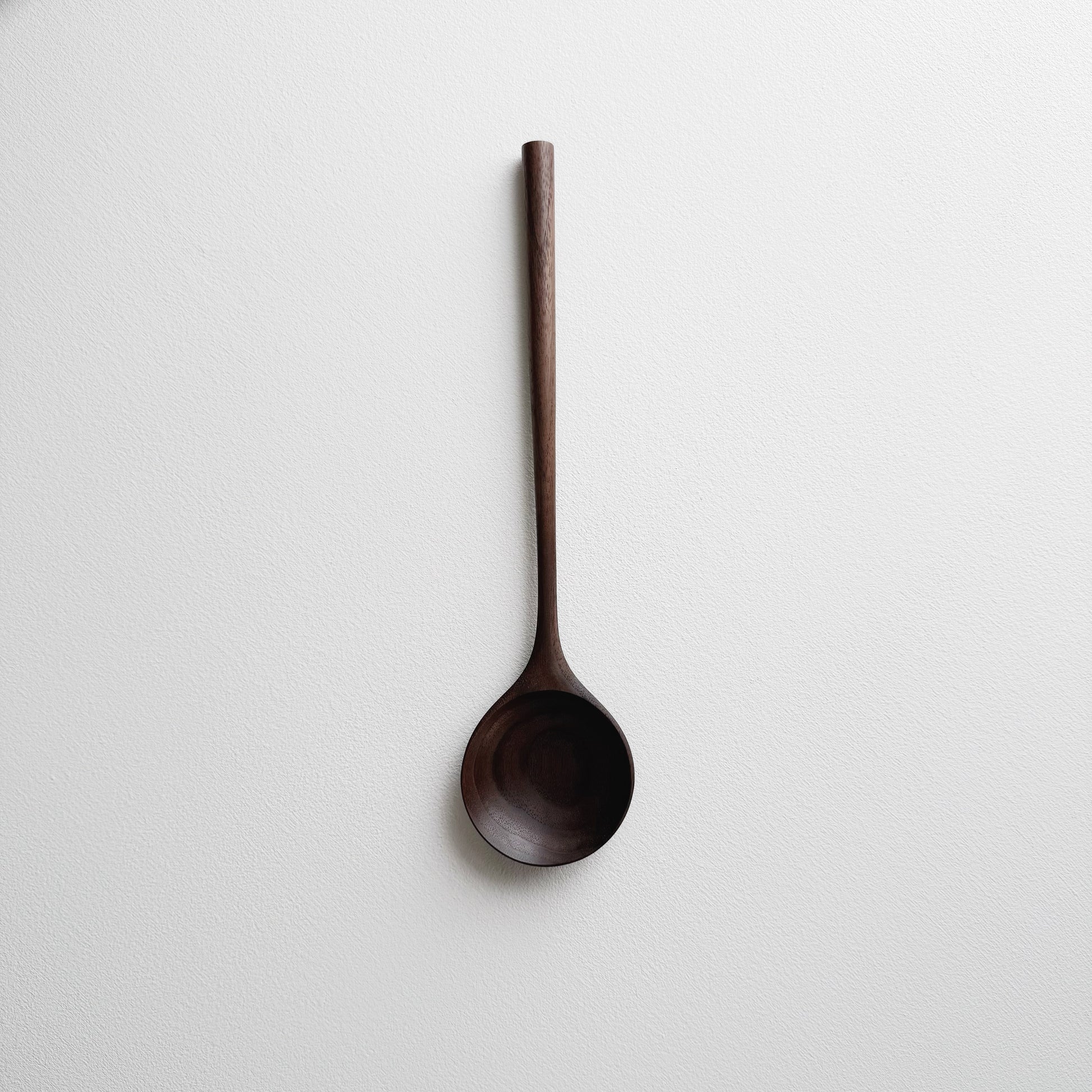 Medium serving spoon in dark walnut
