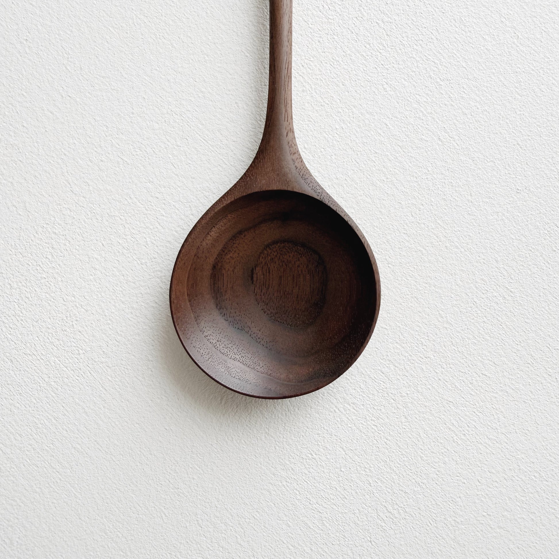 Medium serving spoon in dark walnut
