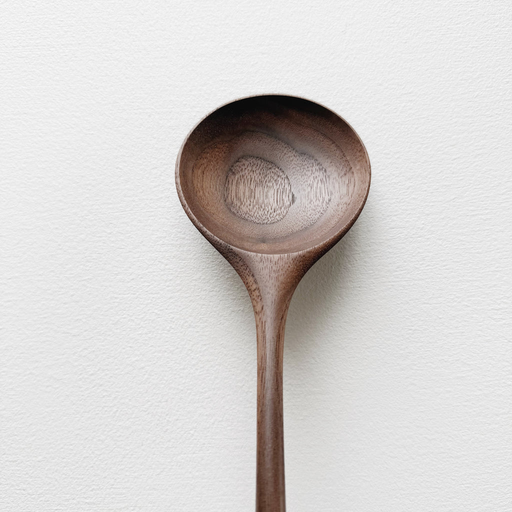 Medium serving spoon in dark walnut