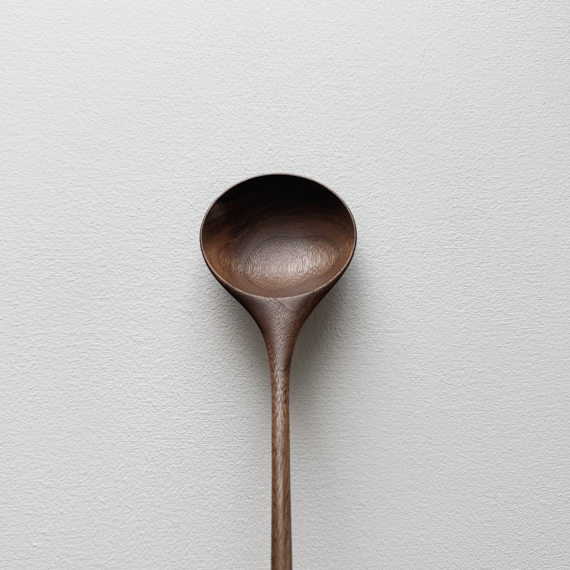 Medium serving spoon in tanned walnut