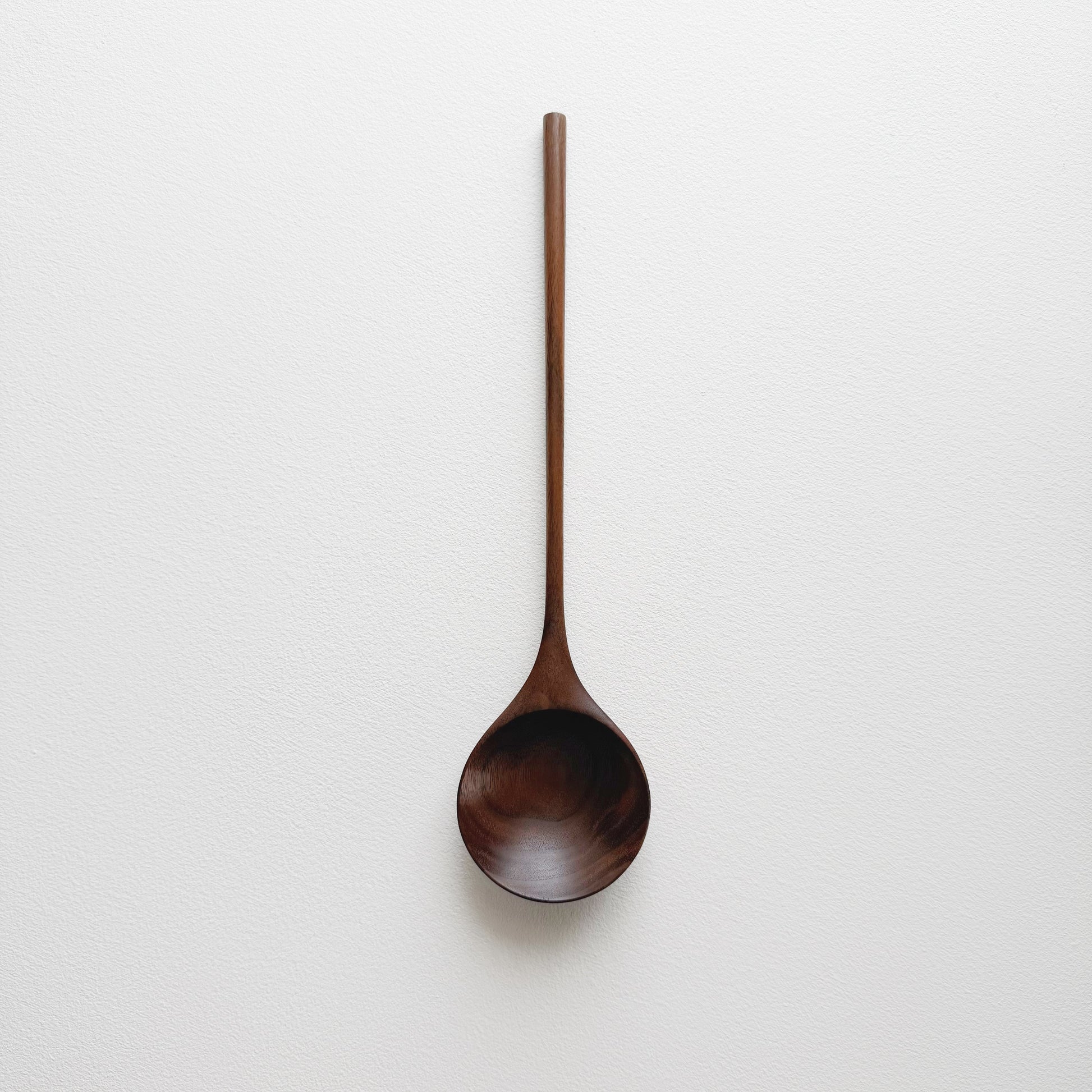 Medium serving spoon in tanned walnut