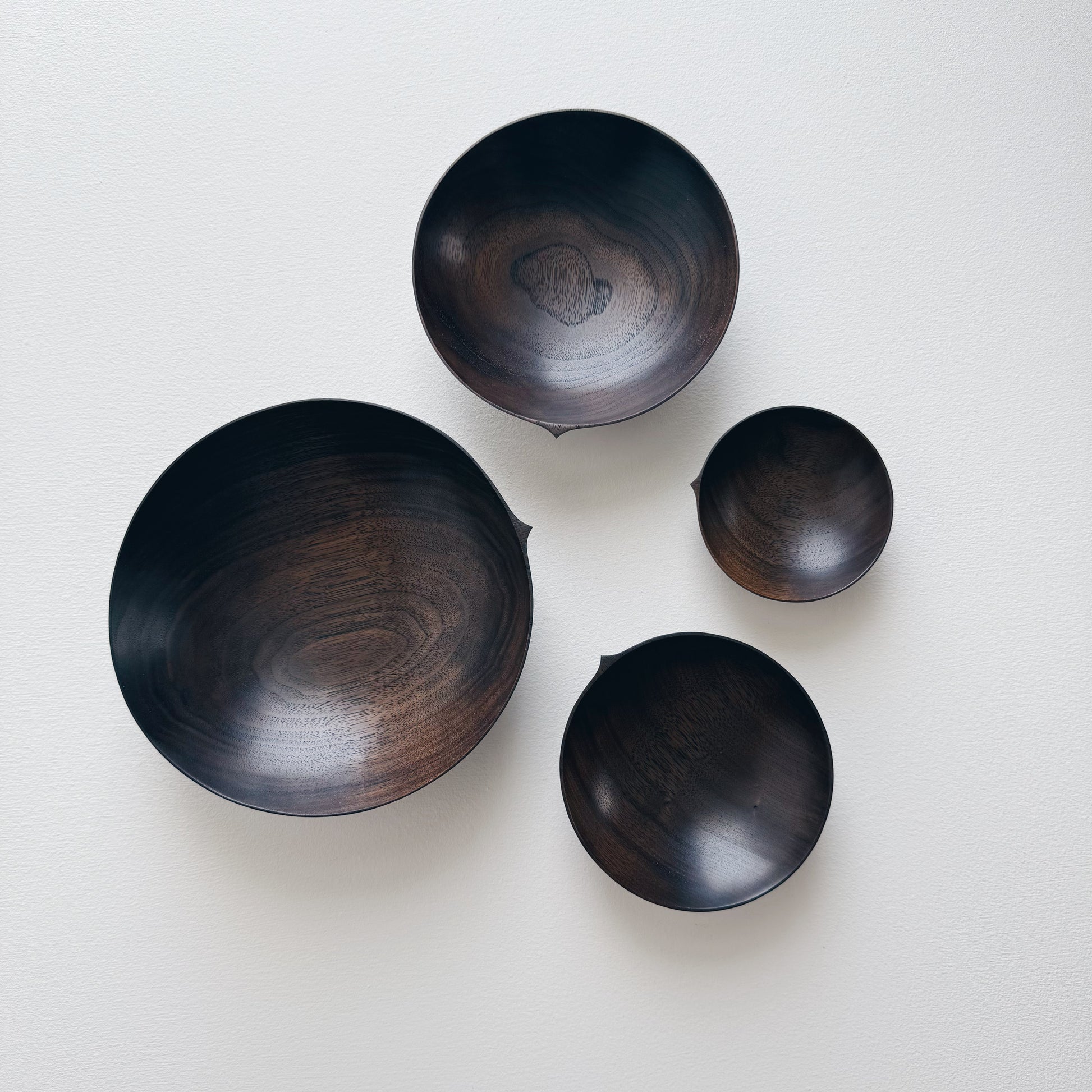 Nesting bowls in vintage black walnut