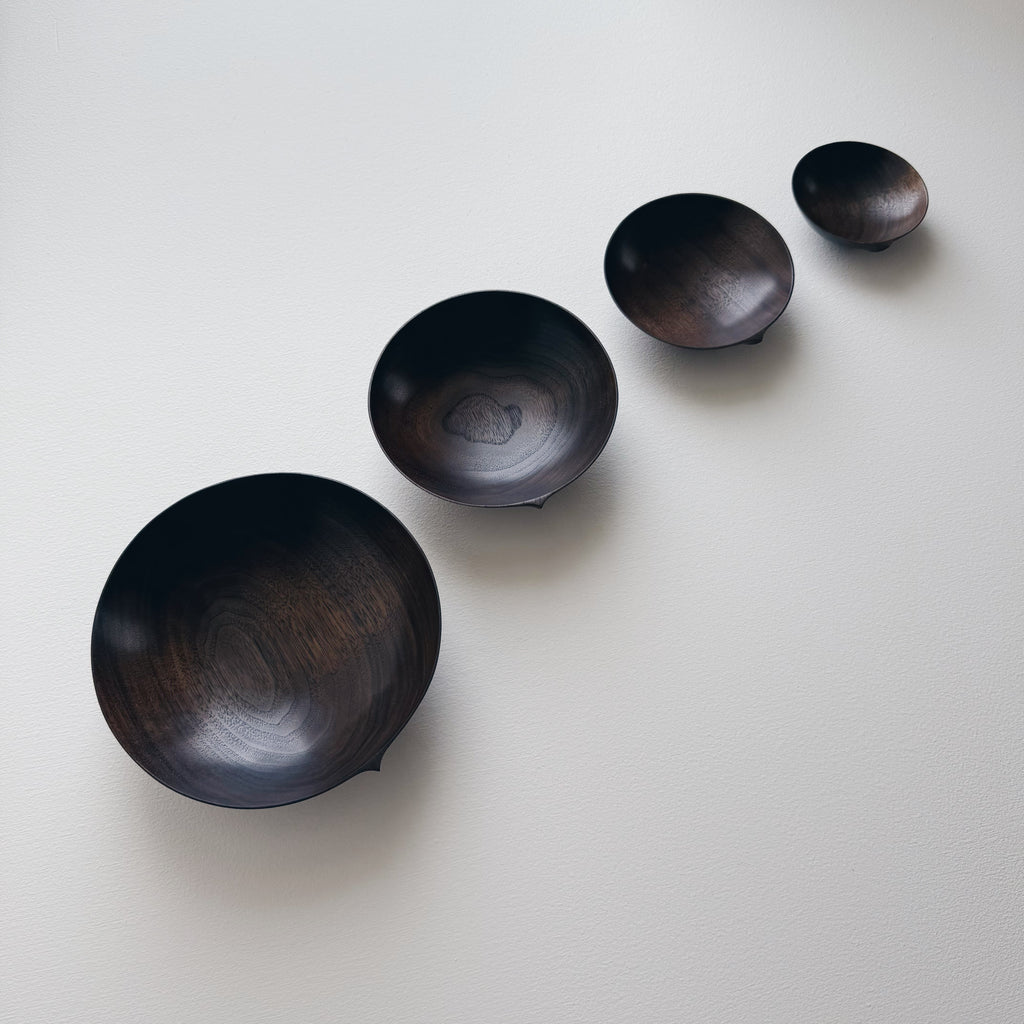 Nesting bowls in vintage black walnut