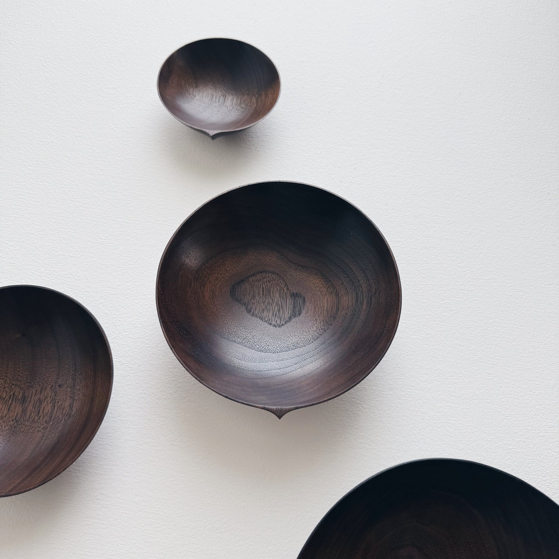 Nesting bowls in vintage black walnut