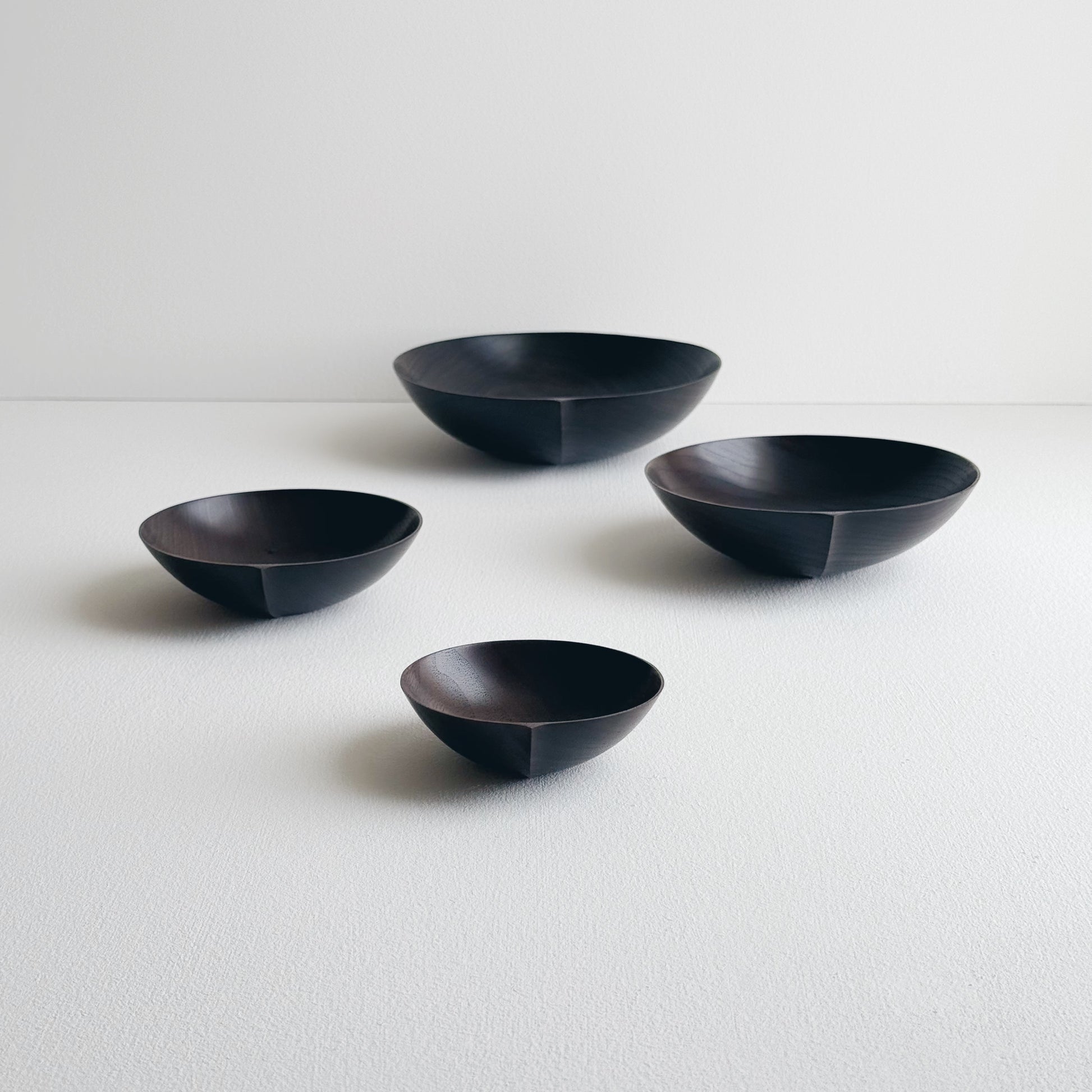 Nesting bowls in vintage black walnut