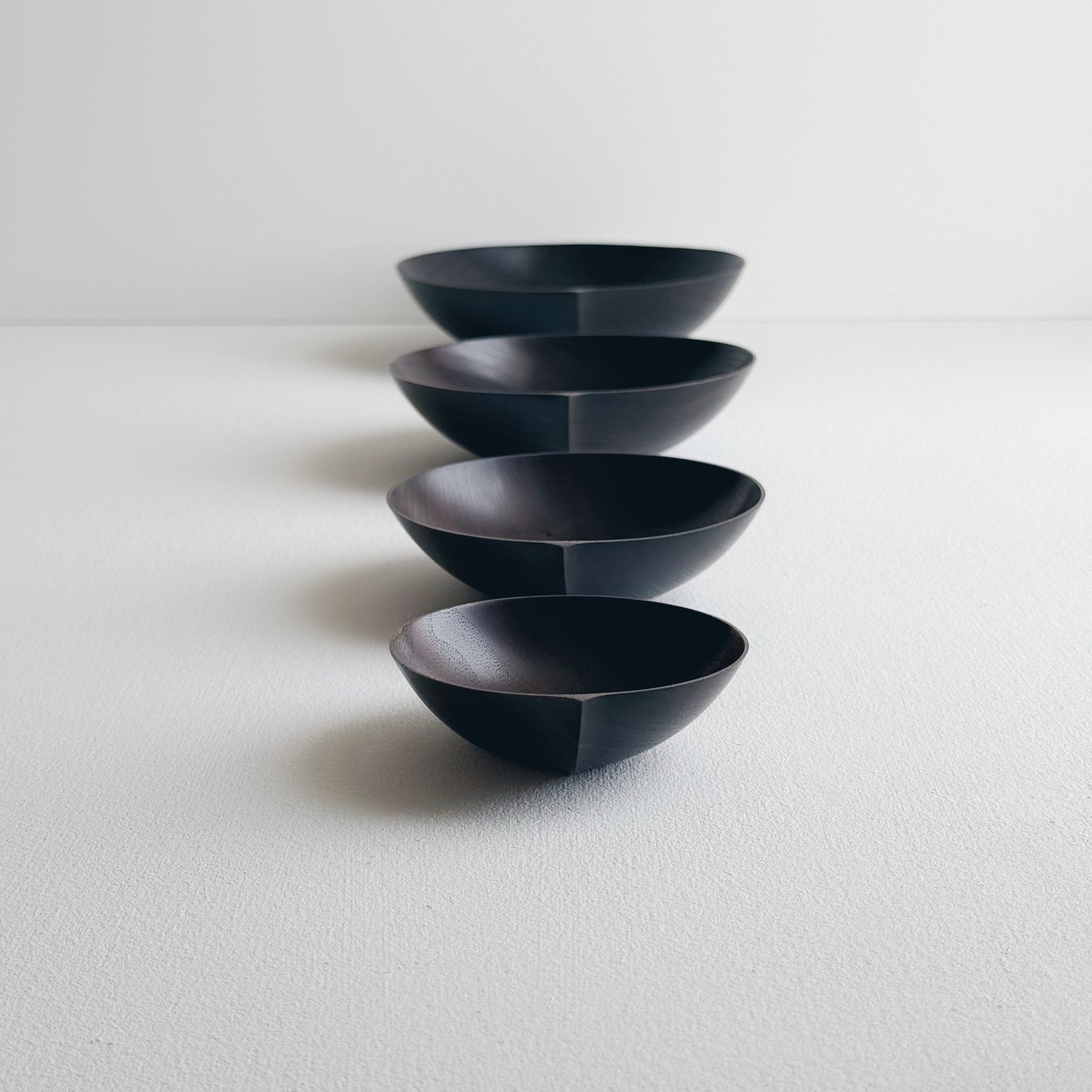 Nesting bowls in vintage black walnut