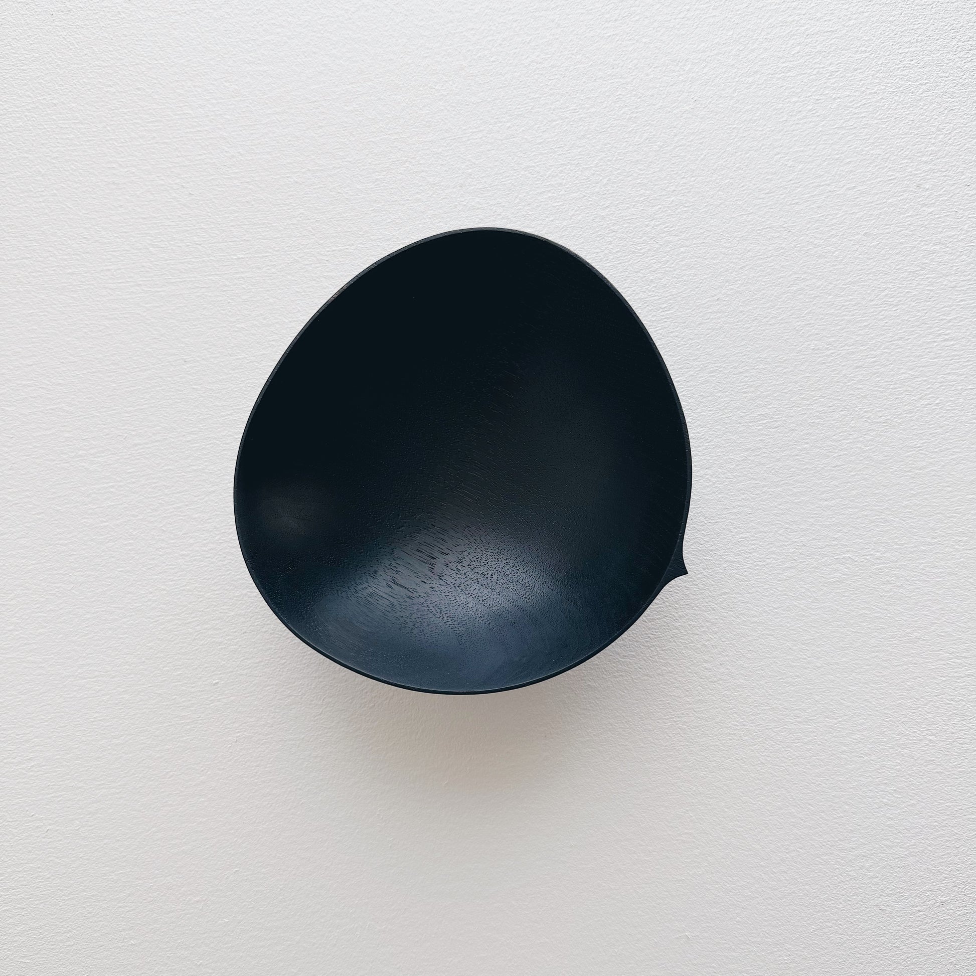 Oval bowl in ebonised walnut