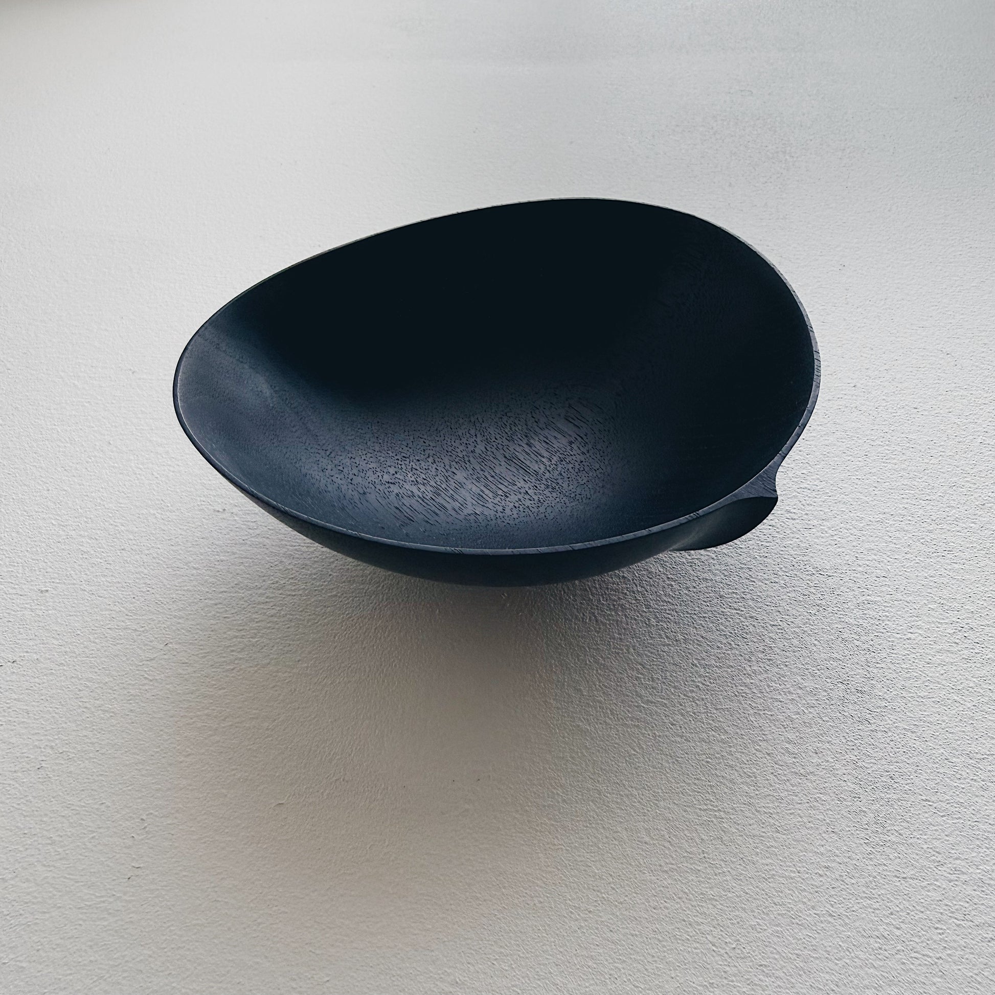 Oval bowl in ebonised walnut