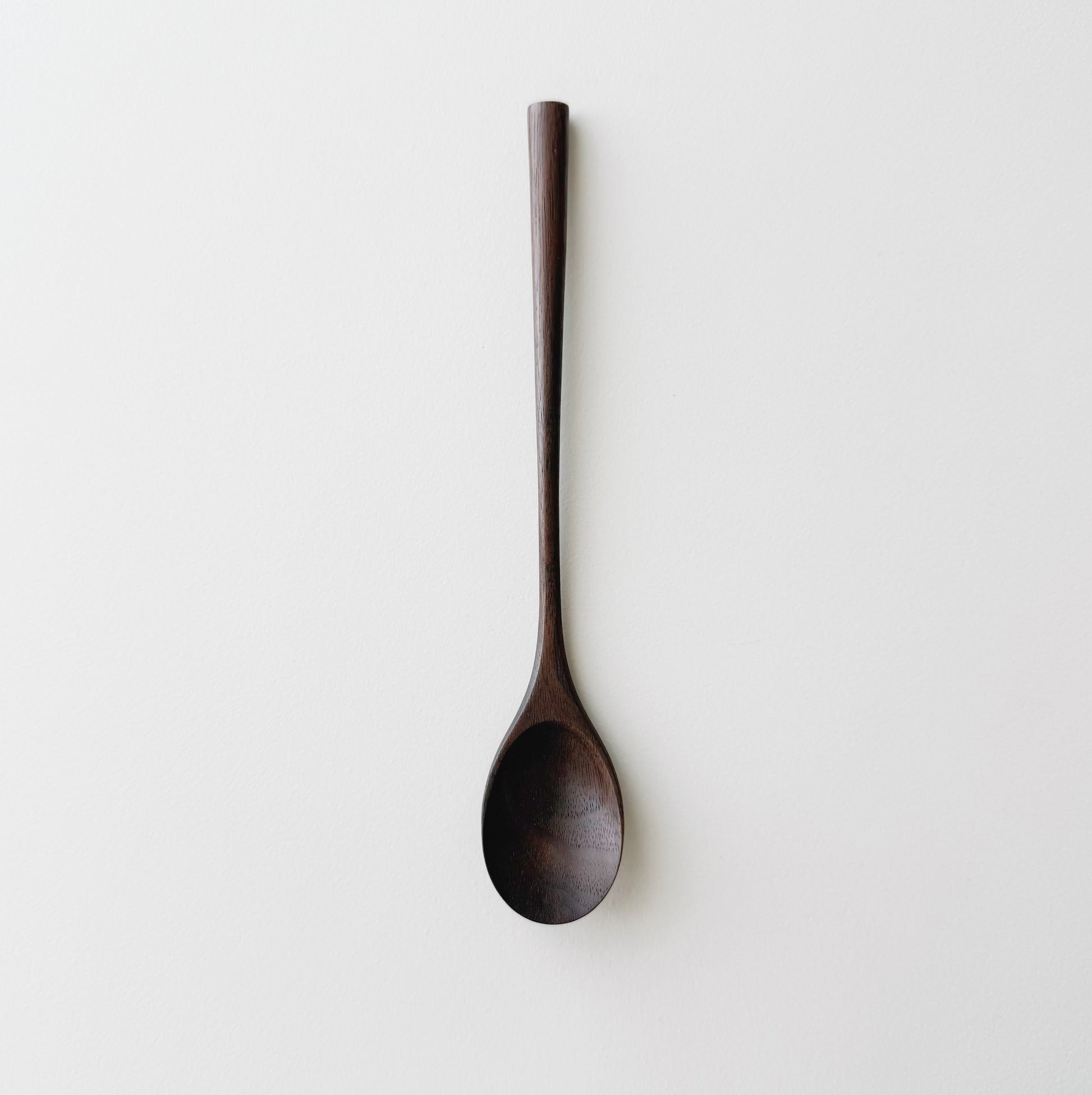 Oval eating spoon in walnut