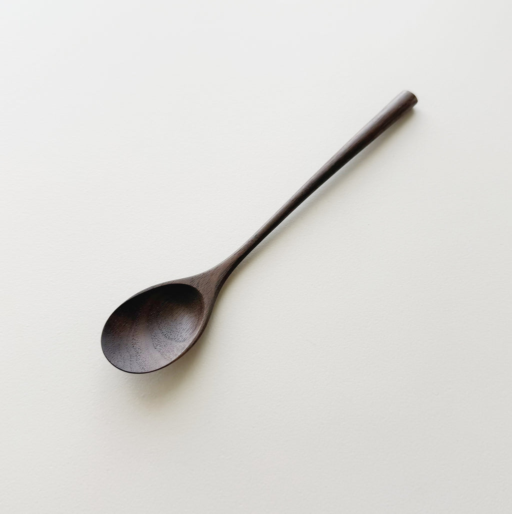 Oval eating spoon in walnut