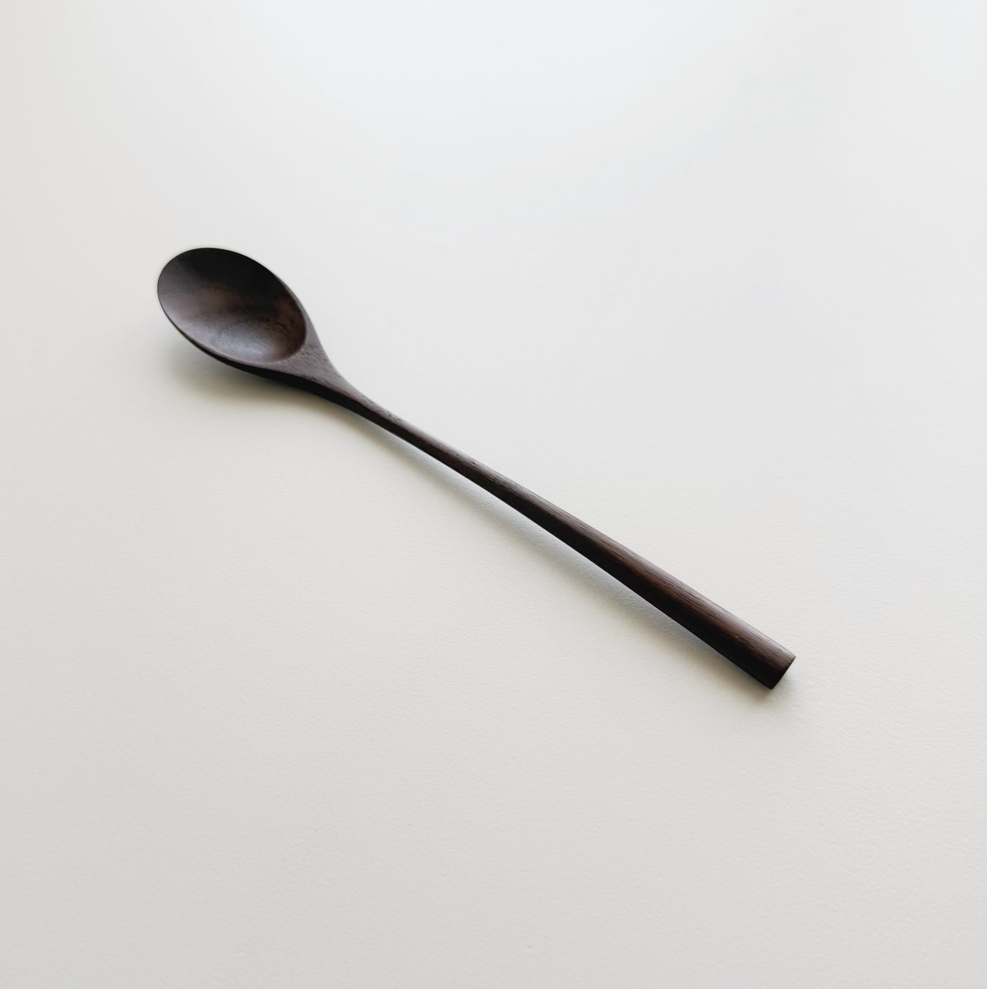 Oval eating spoon in walnut