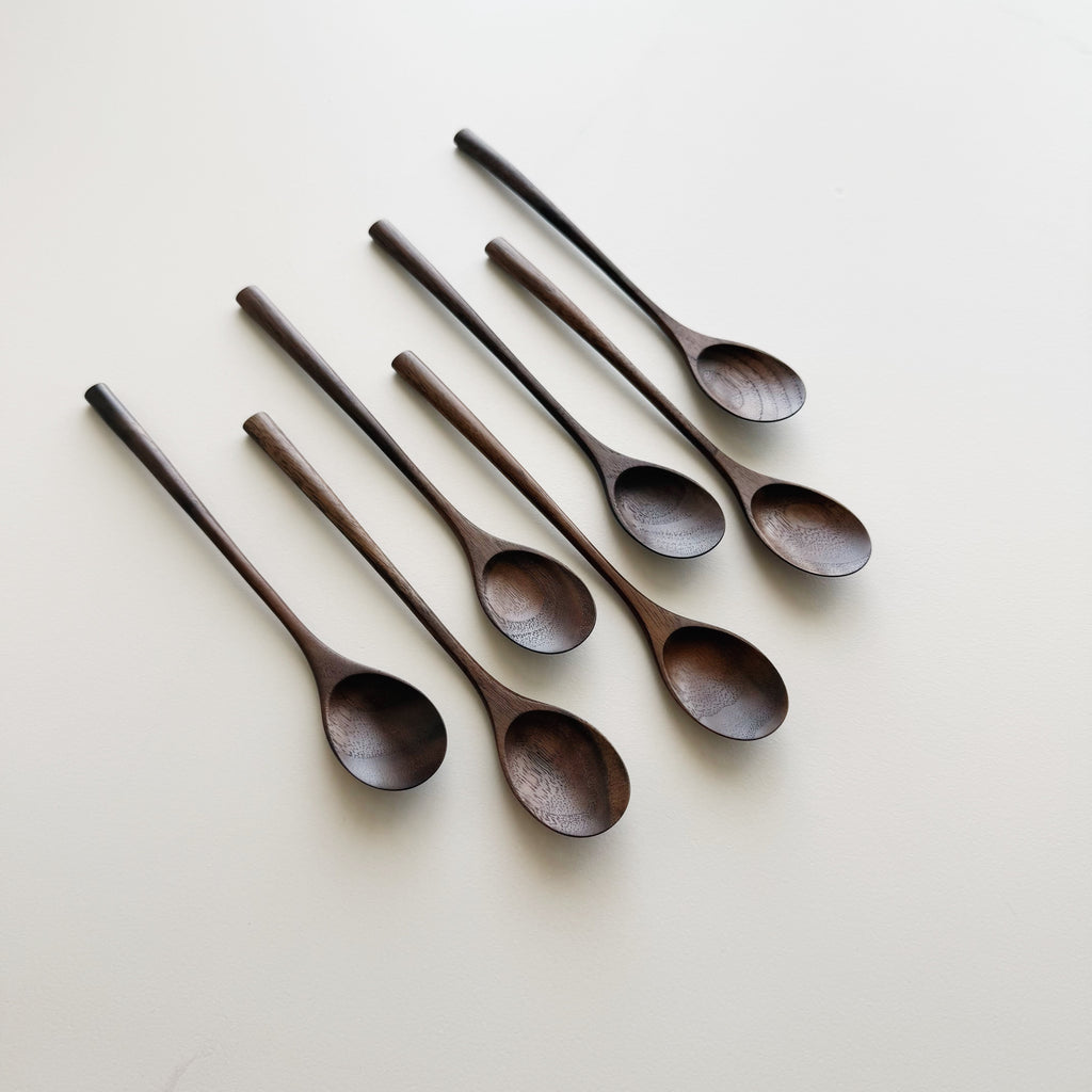 Oval eating spoon in walnut