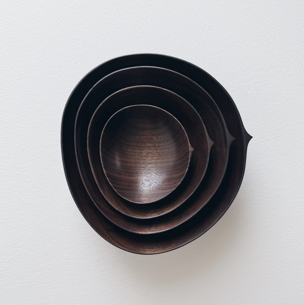Oval nesting bowls in vintage black walnut