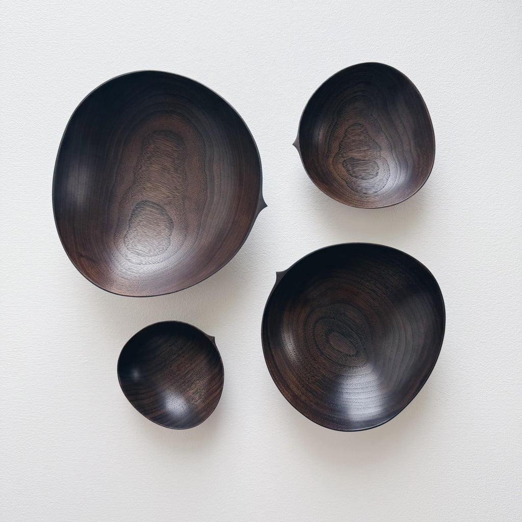 Oval nesting bowls in vintage black walnut