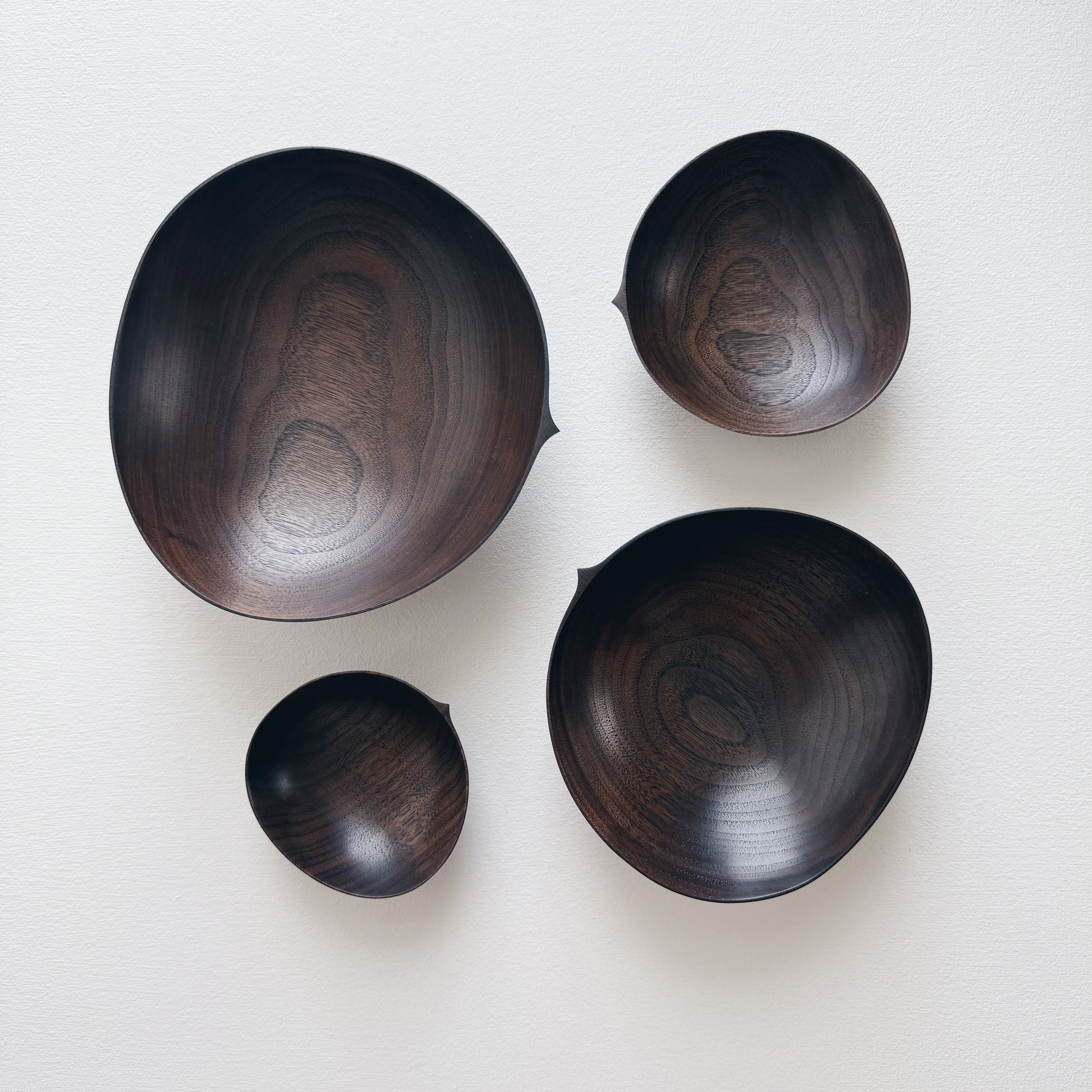 Oval nesting bowls in vintage black walnut