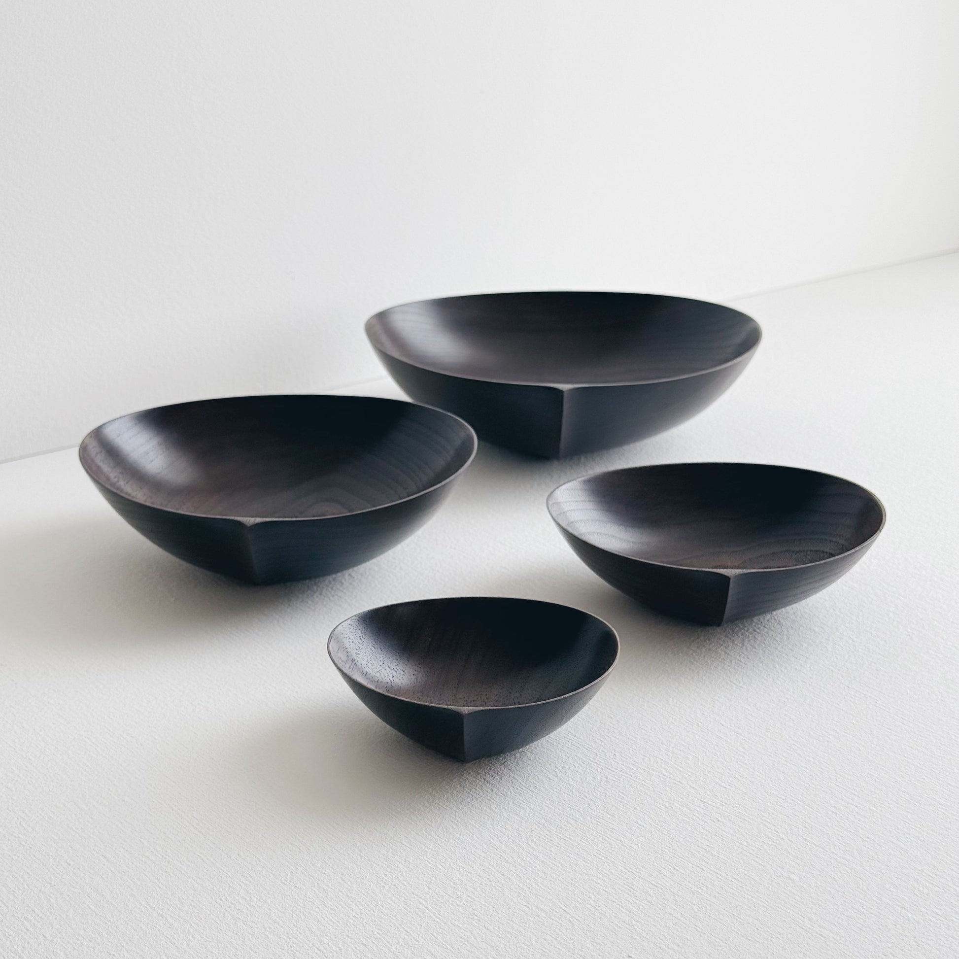 Oval nesting bowls in vintage black walnut