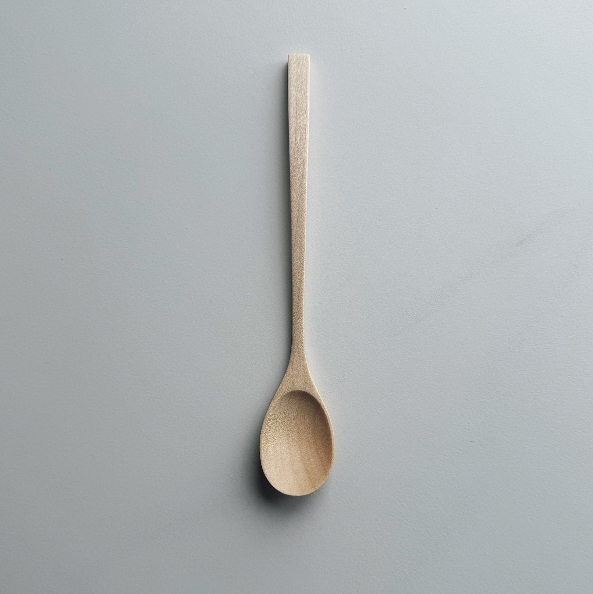 Oval eating spoon in sycamore