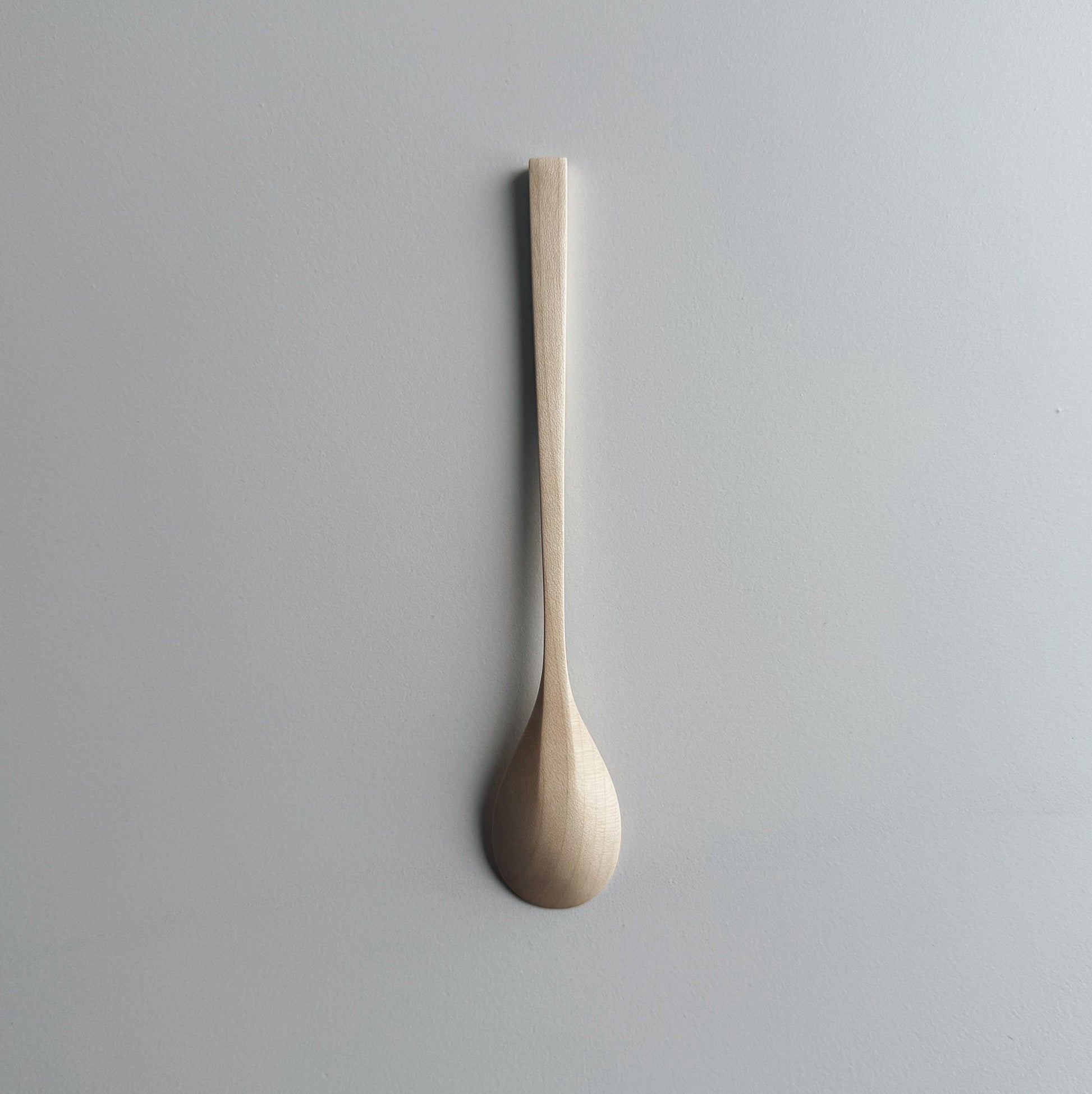 Oval eating spoon in sycamore