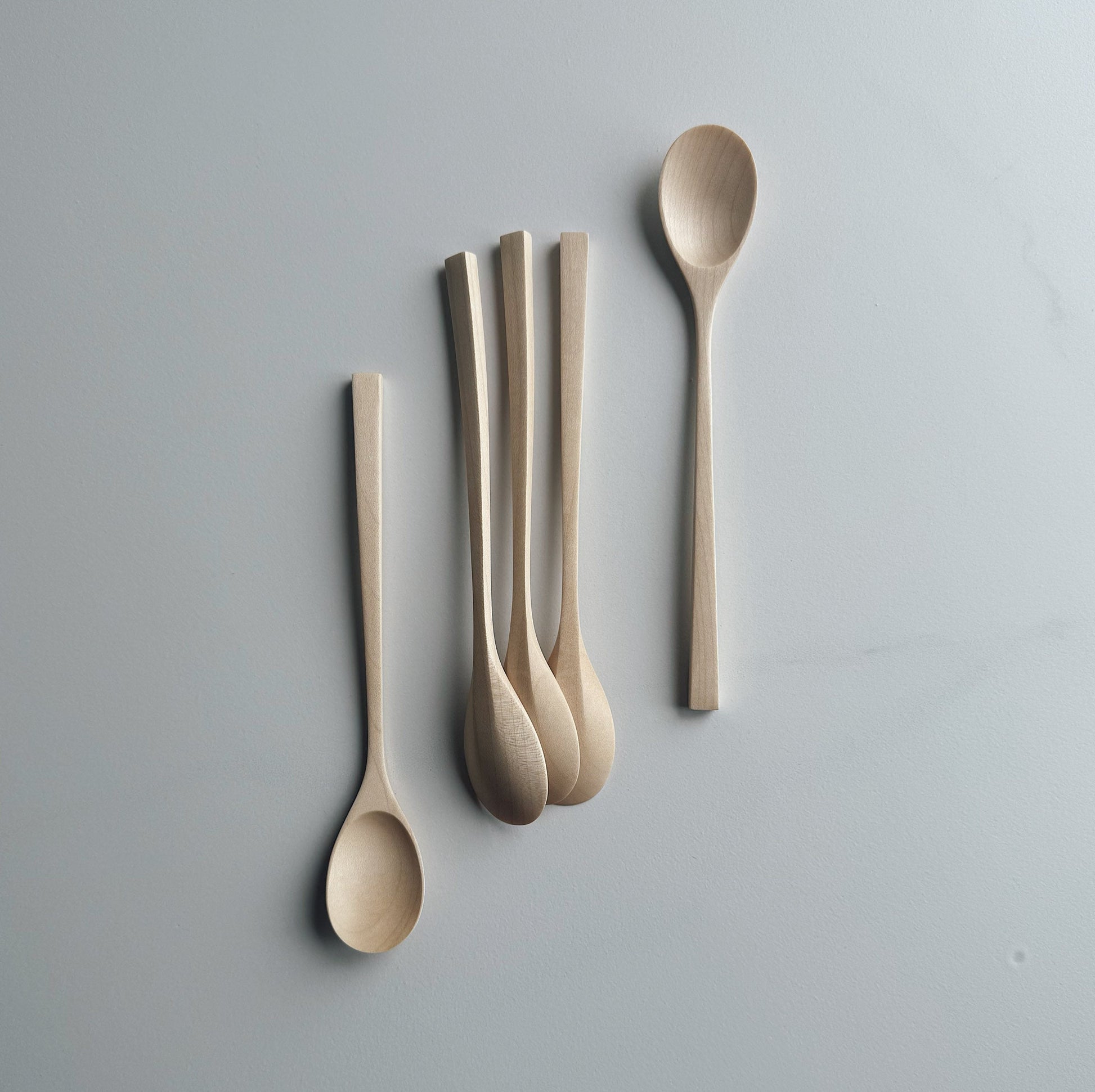 Oval eating spoon in sycamore