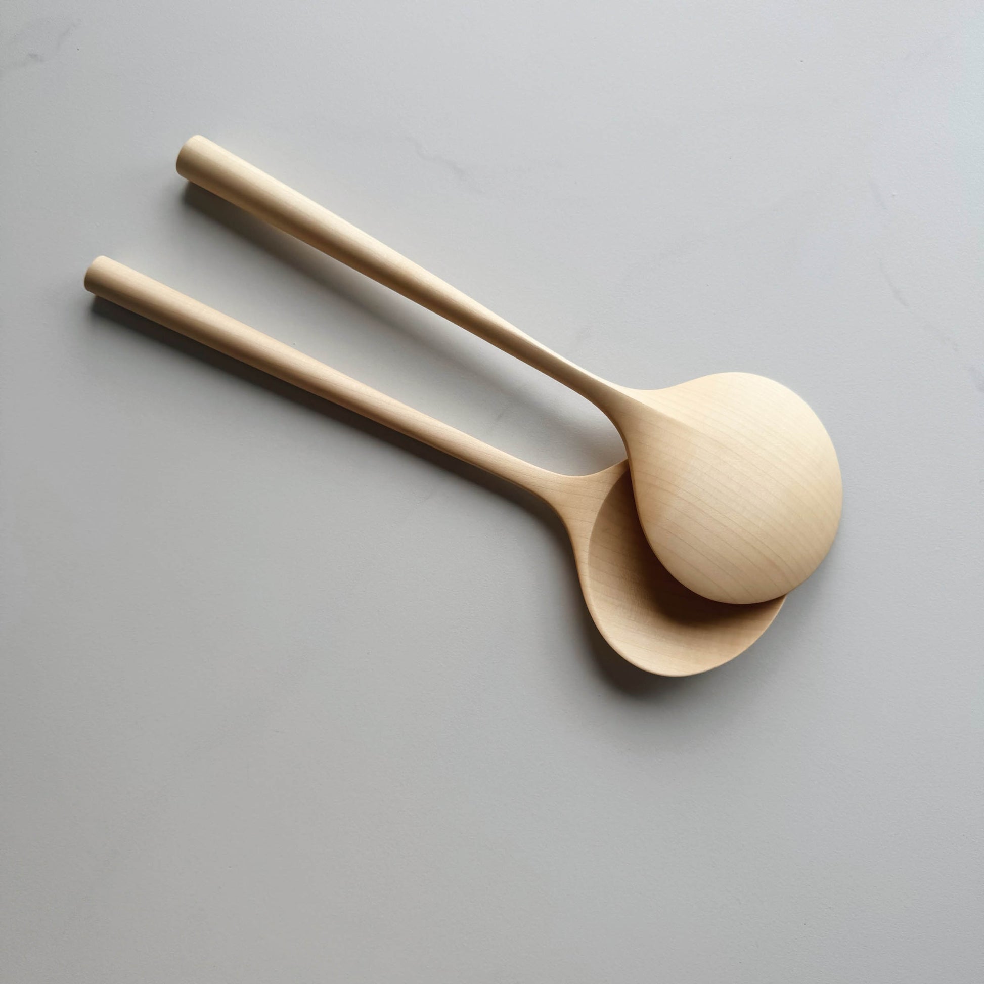 Two large oval servers on a white background
