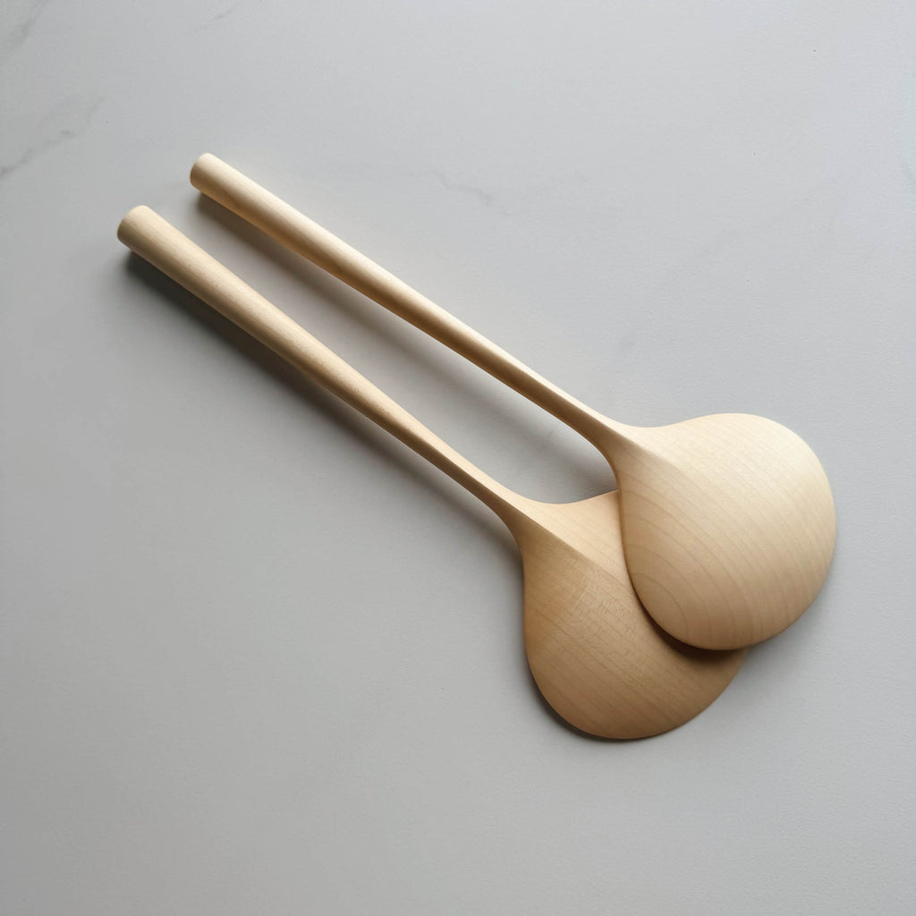 Two large oval servers on a white background
