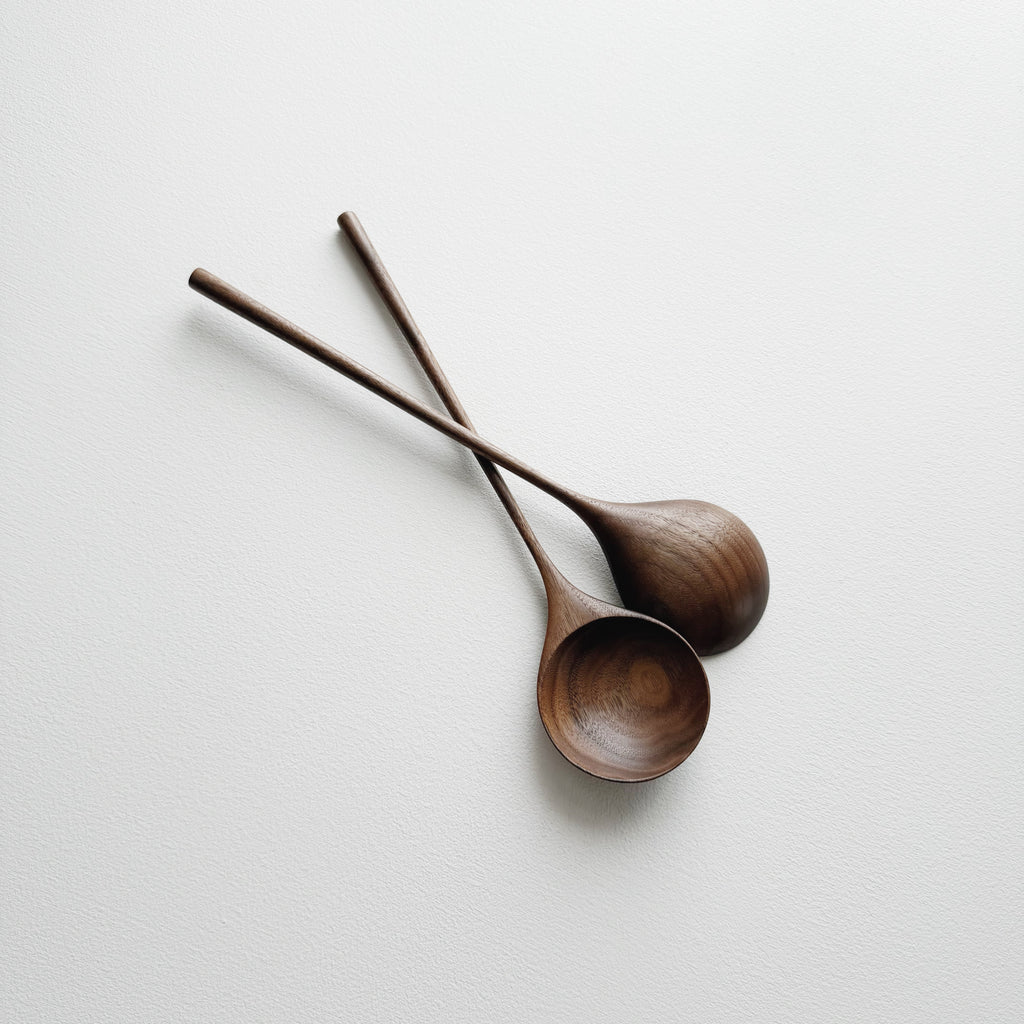 Pair of medium serving spoons in walnut