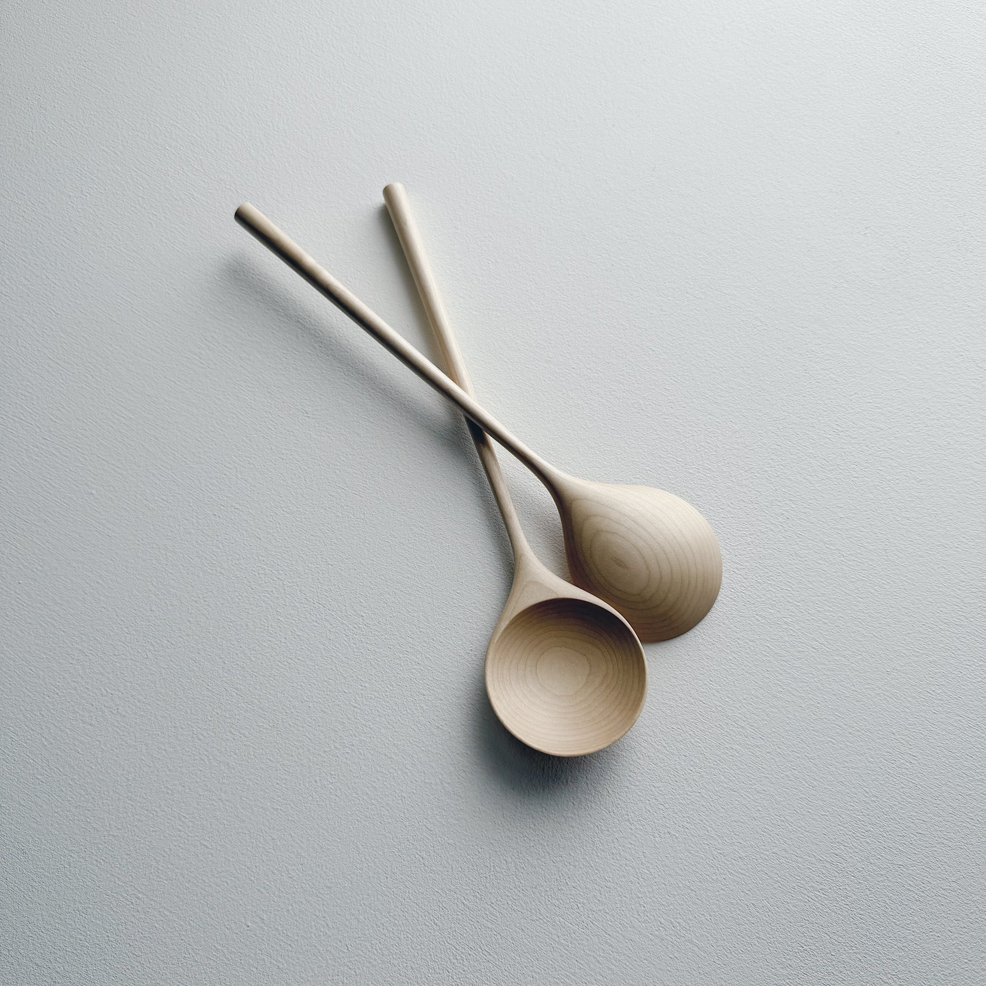 Pair of medium serving spoons in sycamore