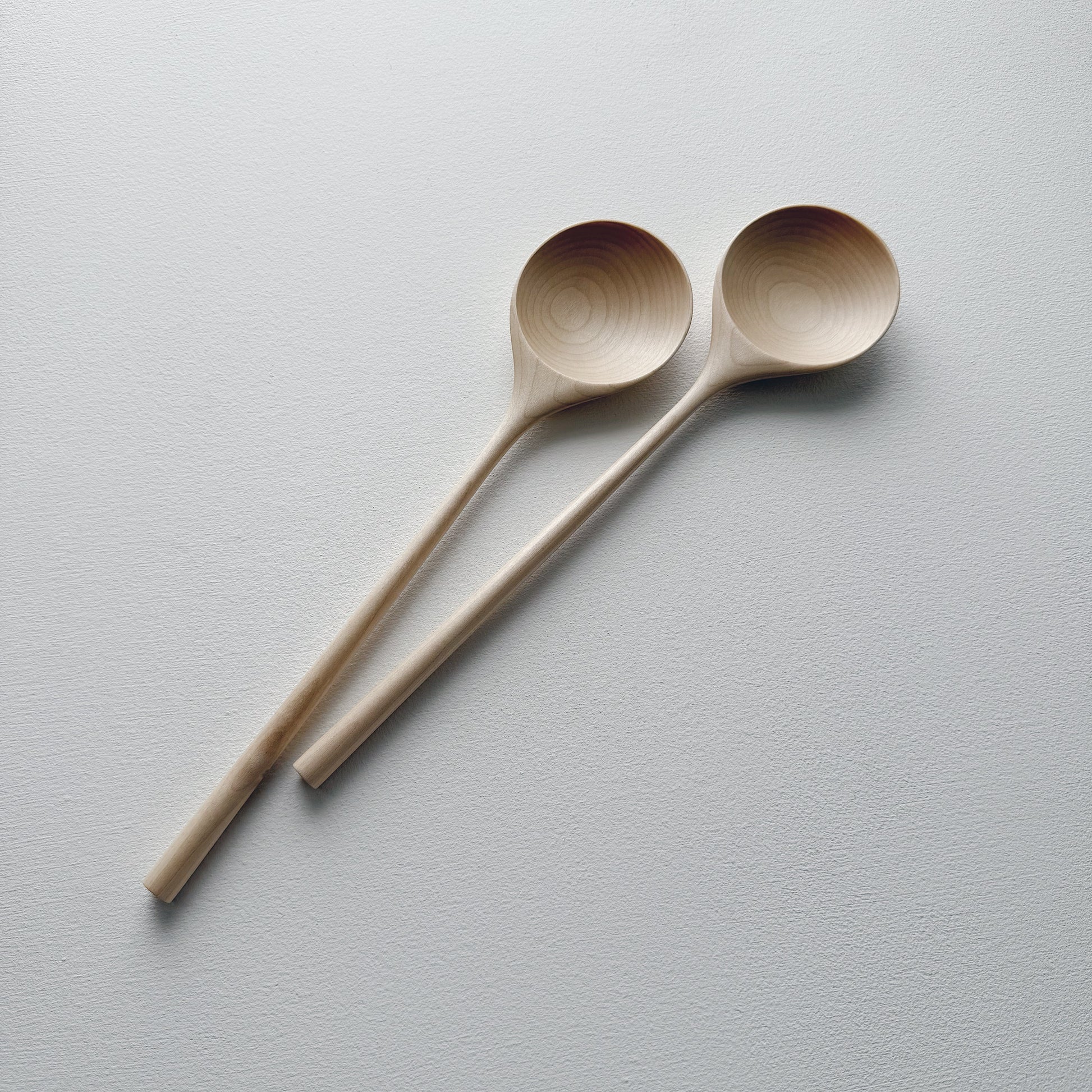 Pair of medium serving spoons in sycamore