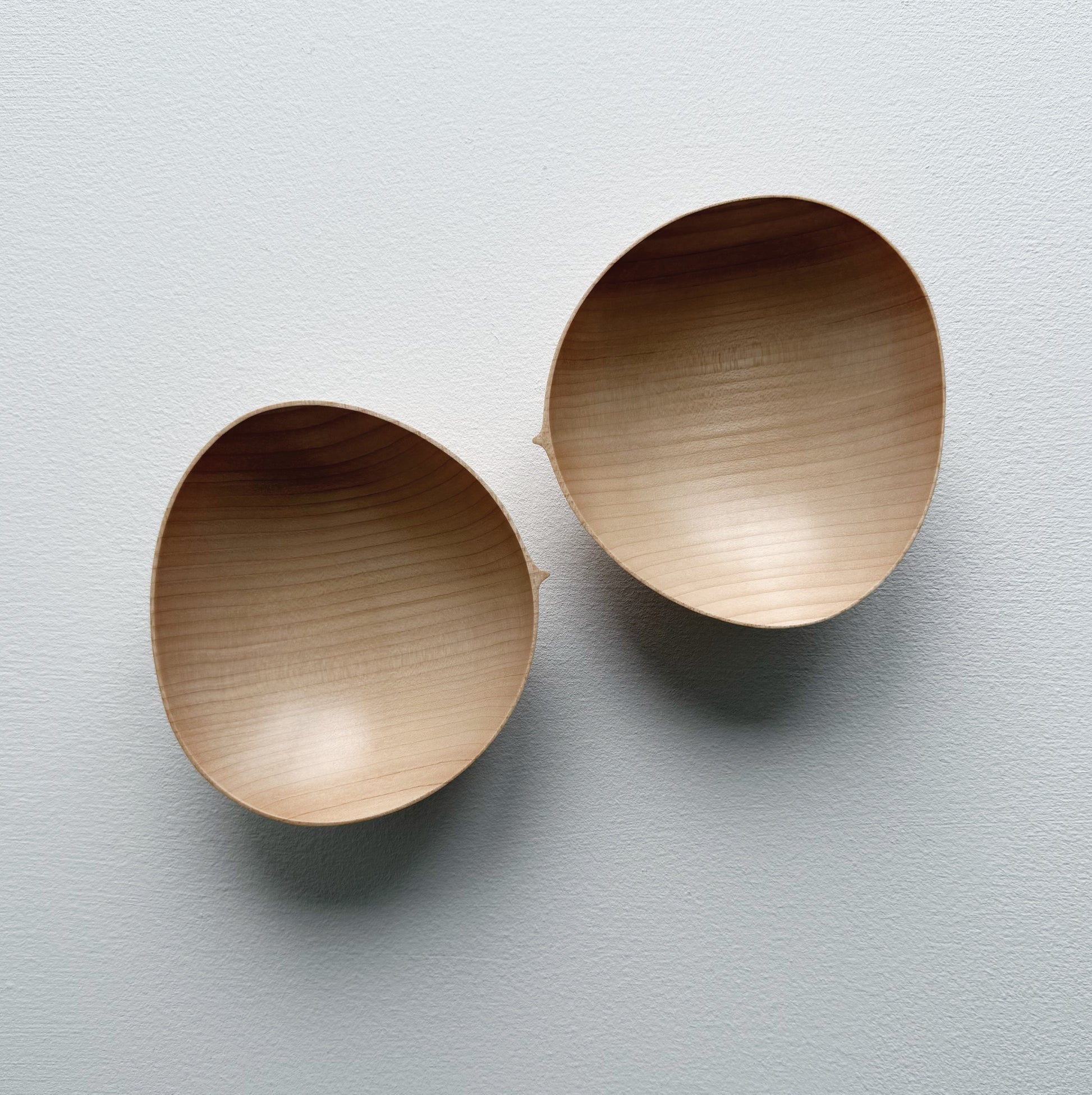 Pair of oval bowls in dark sycamore