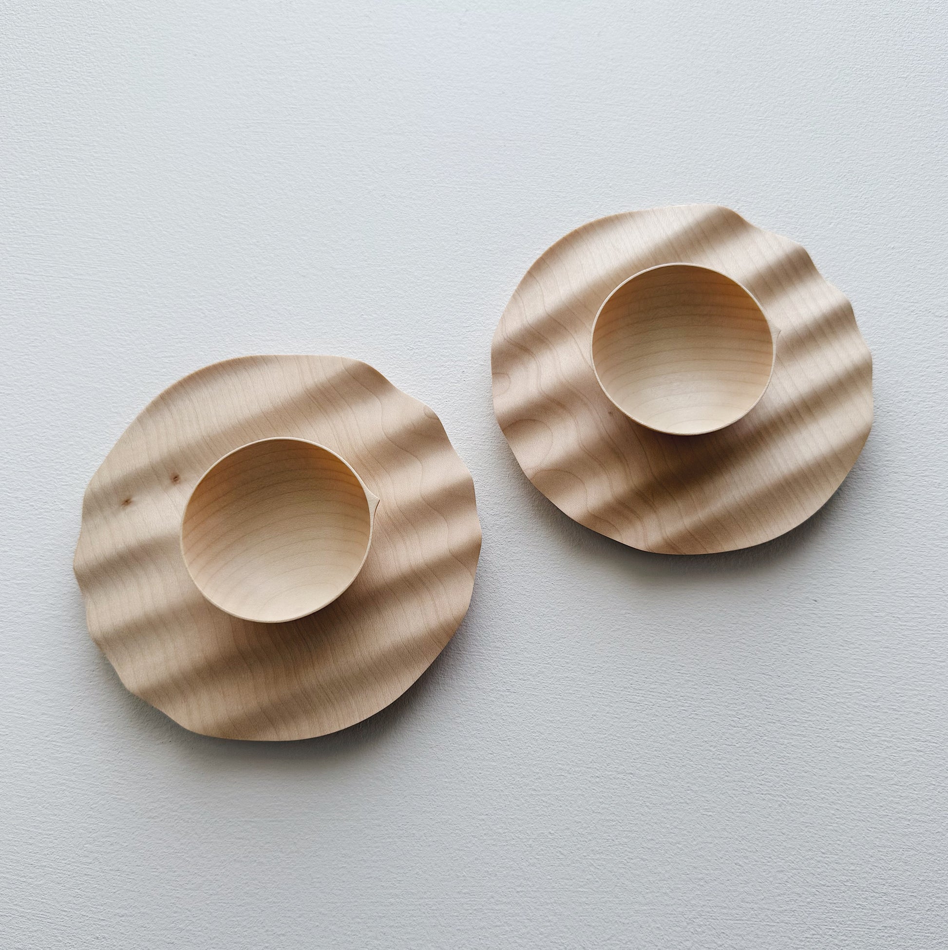 Pair of small wavy plates & bowls in sycamore