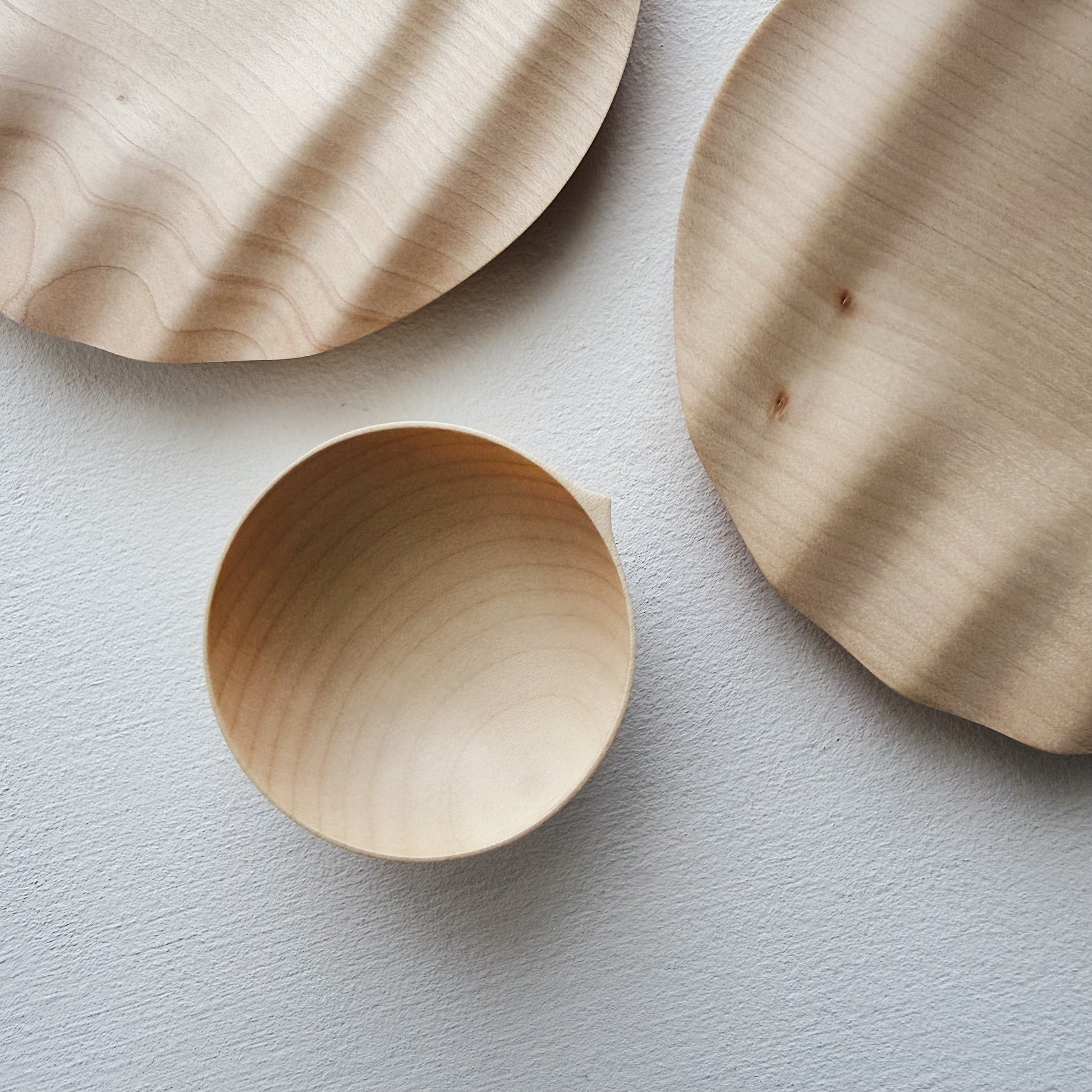 Pair of small wavy plates & bowls in sycamore